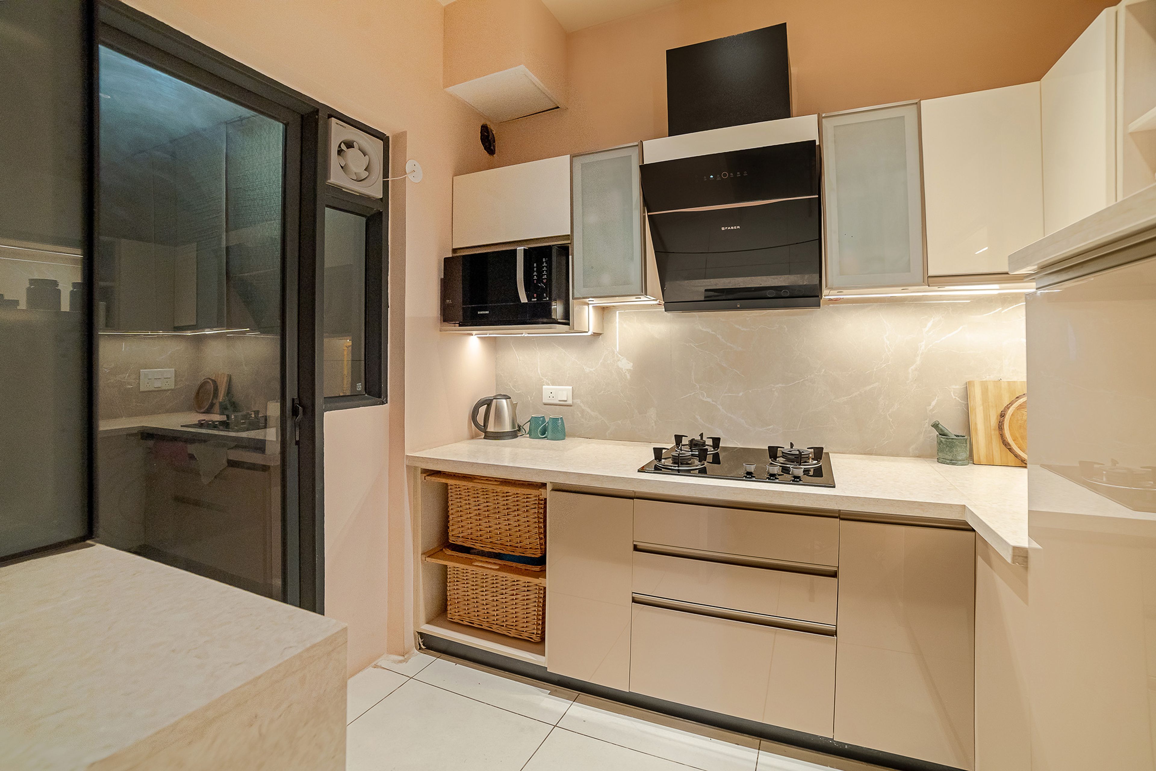L-Shaped Kitchen Design with Light Brown Base Unit and Off-White Wall Unit with Quartz Countertop