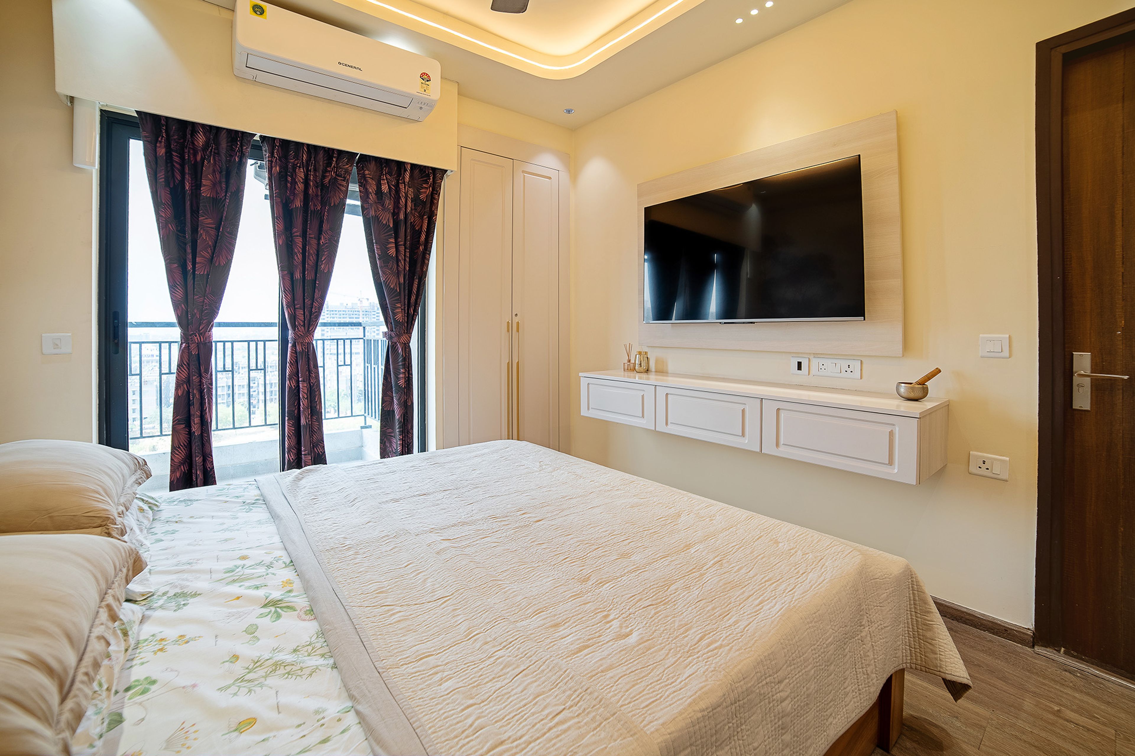 Bedroom Design with Off-White Wall Mounted TV Unit