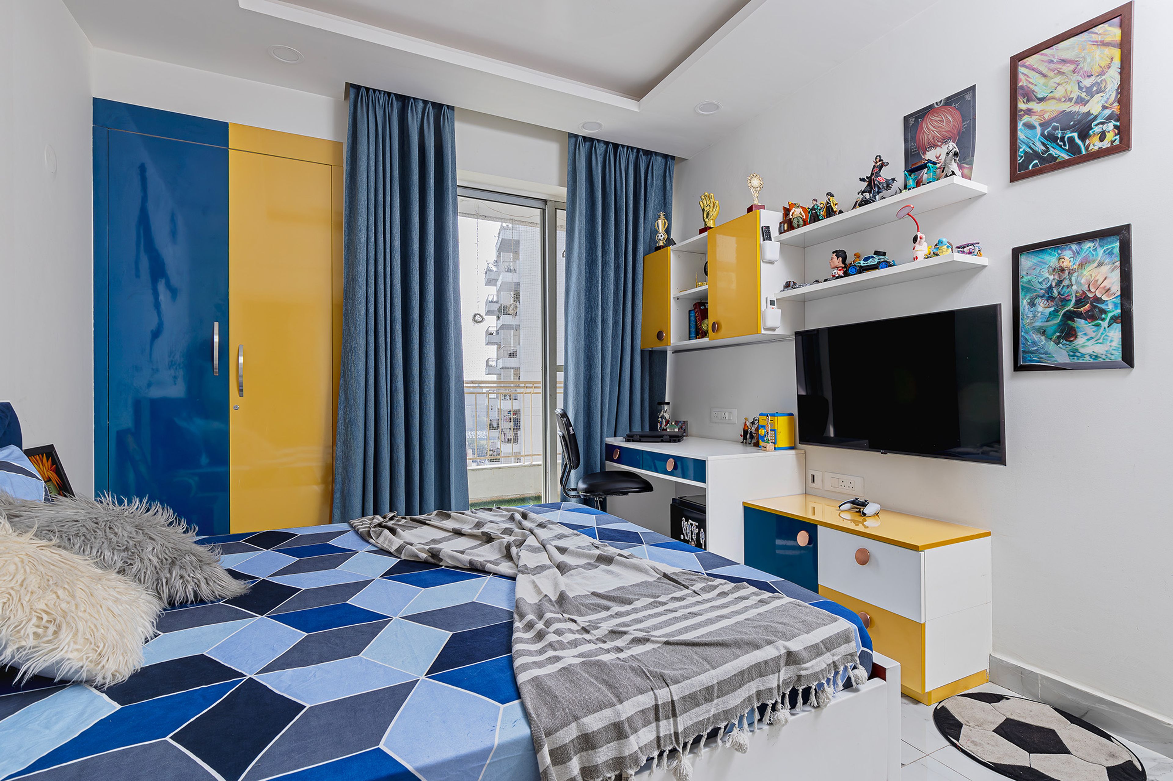 Kids Bedroom Design with Blue and Yellow 2-Door Swing Wardrobe, Study Unit and TV Unit