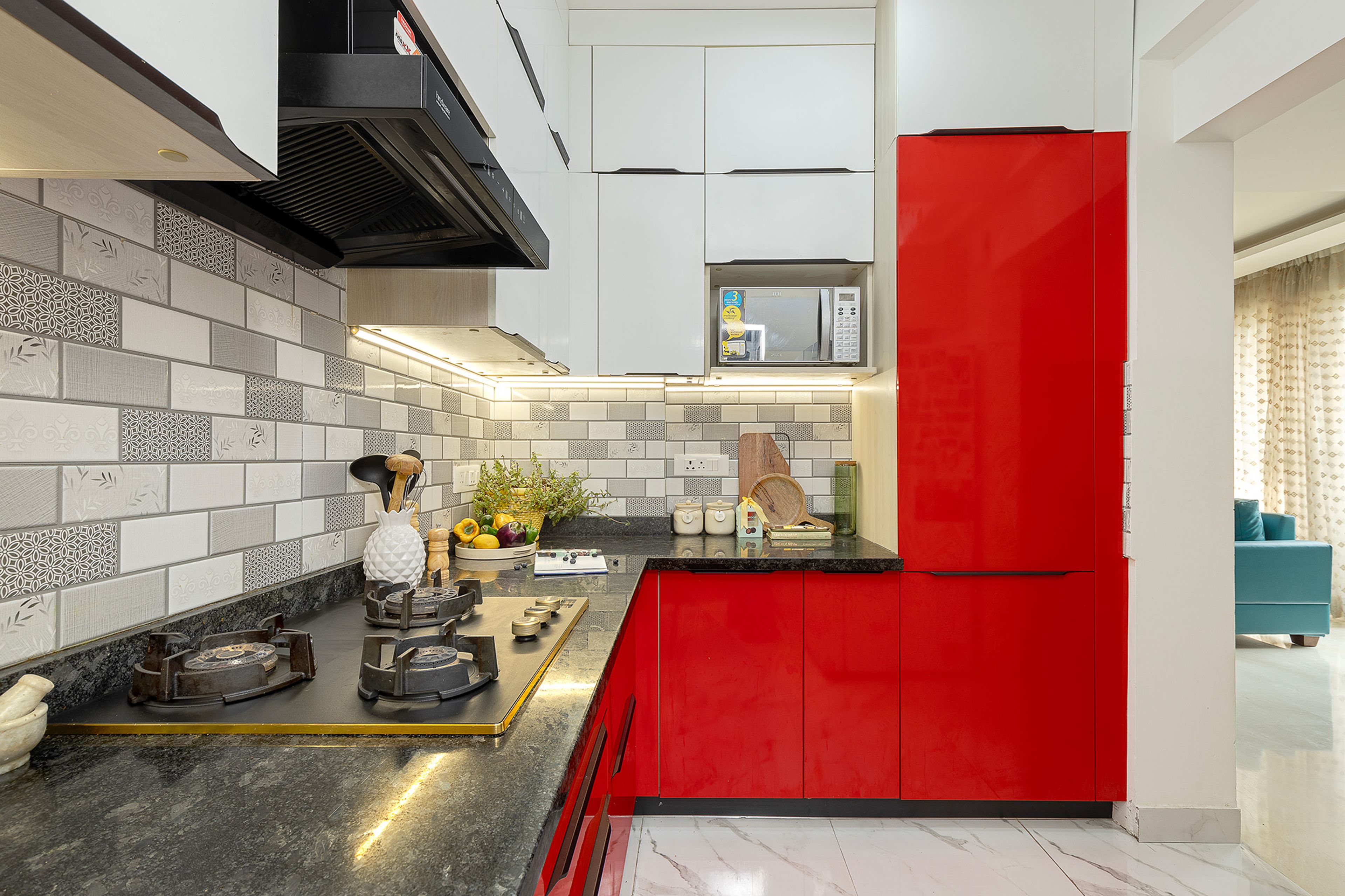 L-Shaped Kitchen Design with Granite Countertop, Red Base units and Grey Wall Units