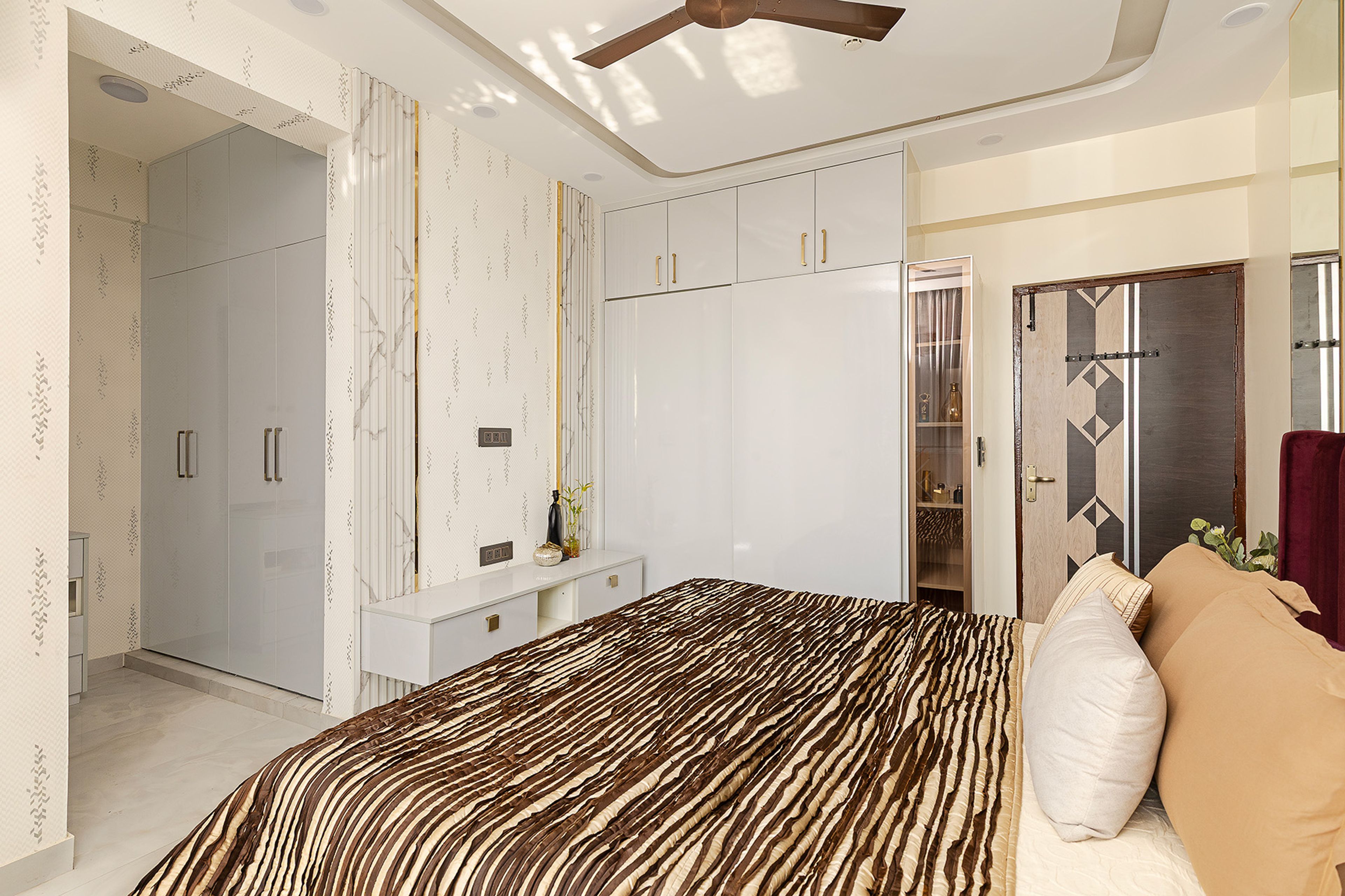 Bedroom Design with 2-door White Sliding Wardrobe, White  TV Unit and 4-Door Grey Swing Wardrobe