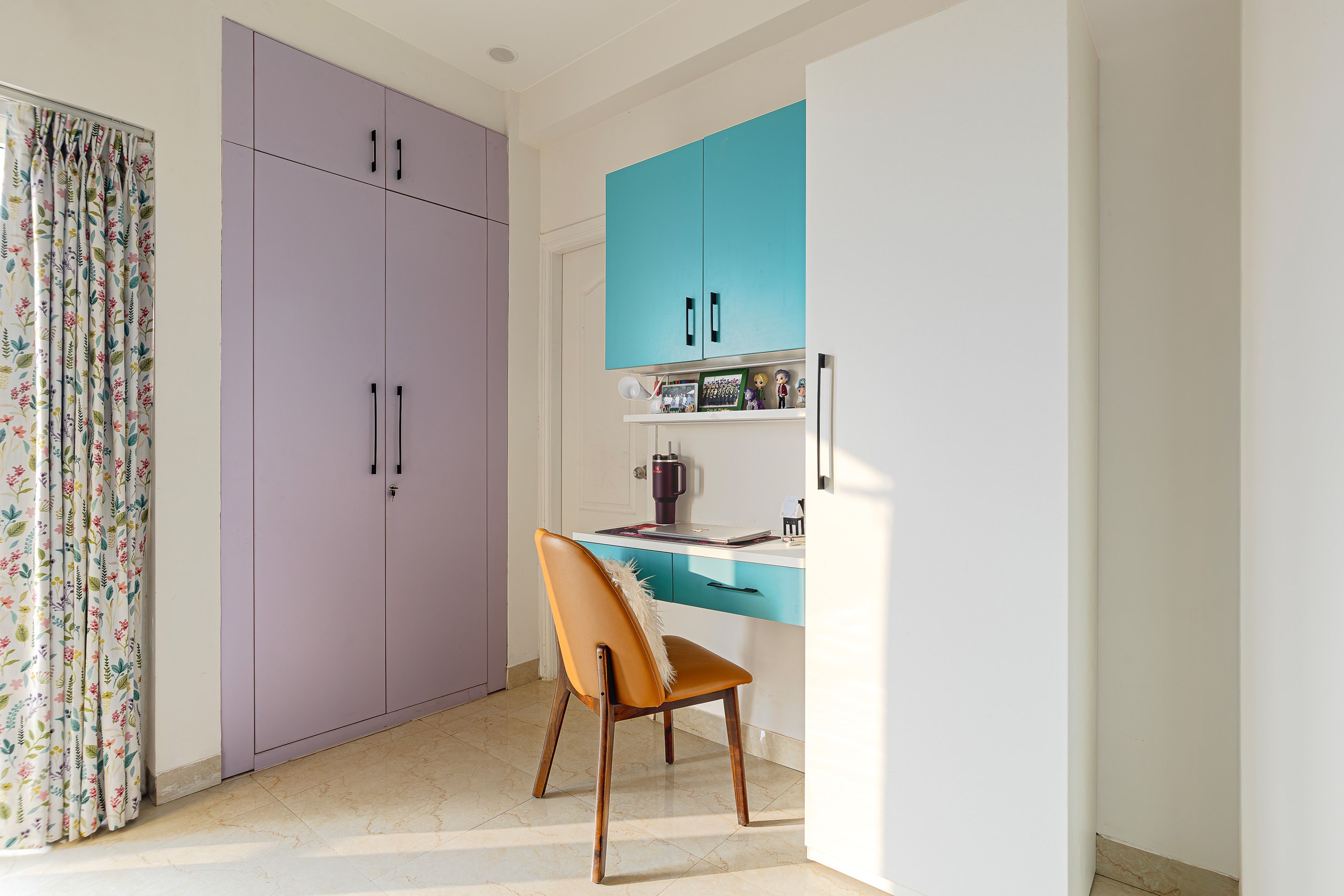 Kids Bedroom Design with Blue Study Space with Brown Chair and Purple 2-Door Swing Wardrobe