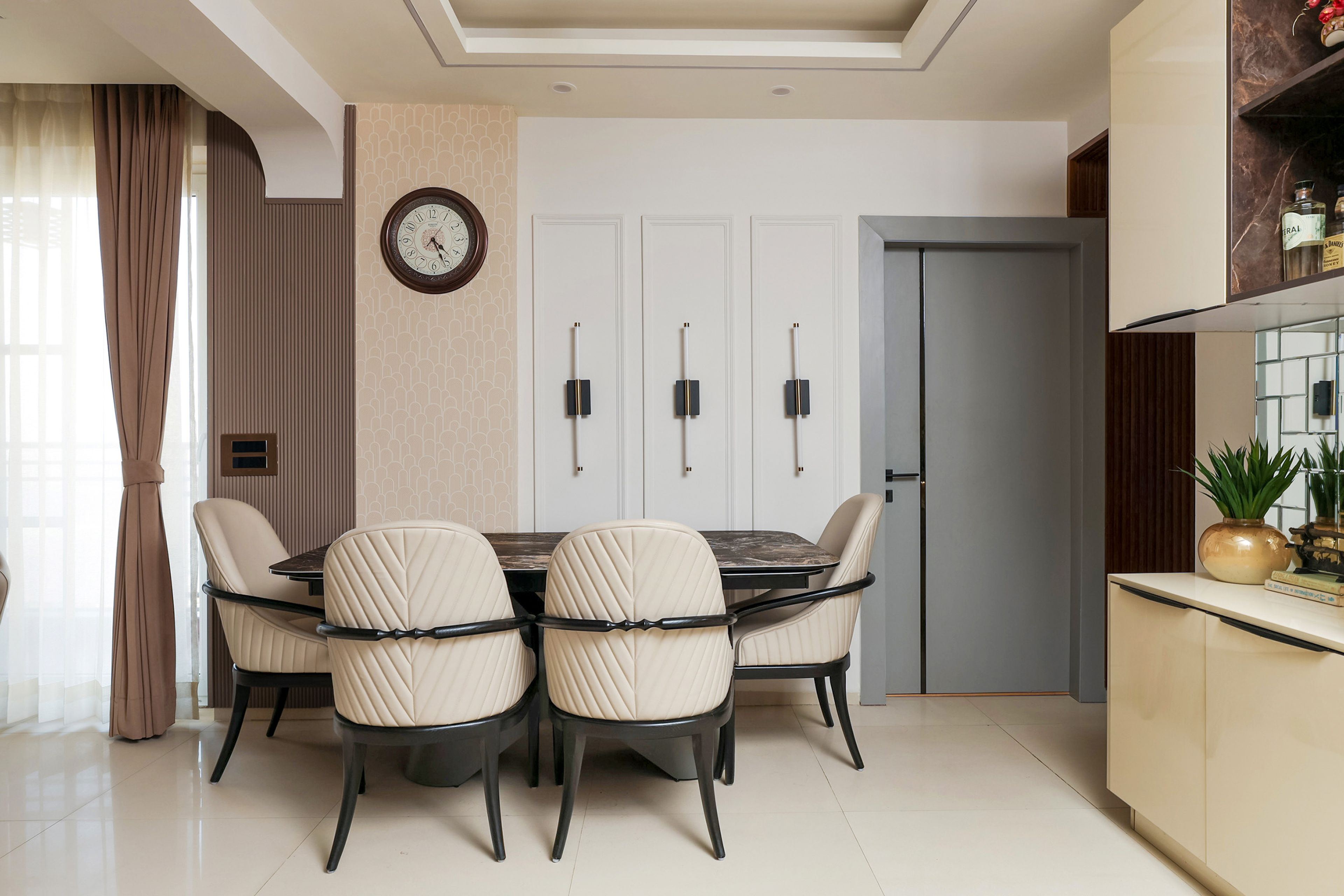 Dining Room Design with 4 Beige Chairs and Marble Patterned Table Top