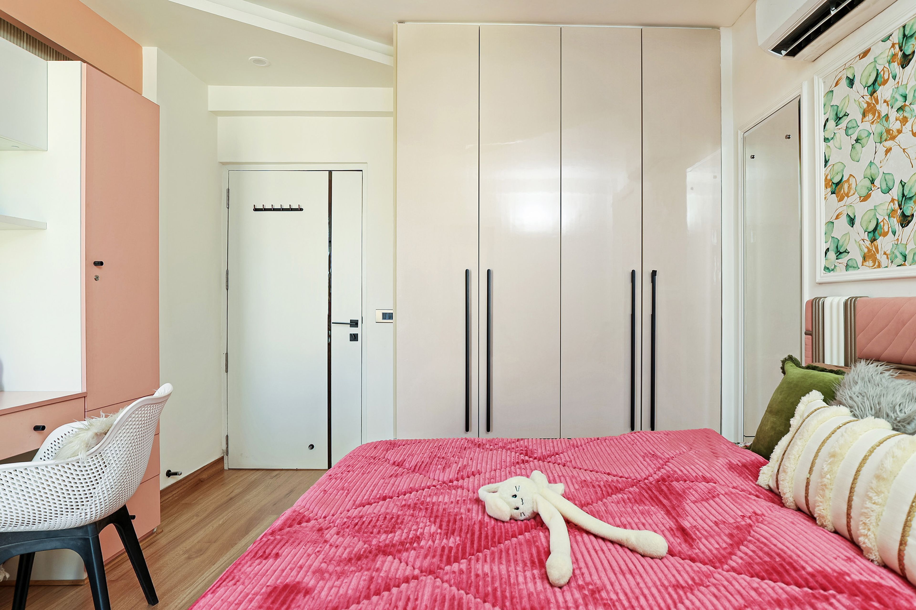 Kids Bedroom Design with Beige 4-Door Swing Wardrobe and Pink Study Space with Storage