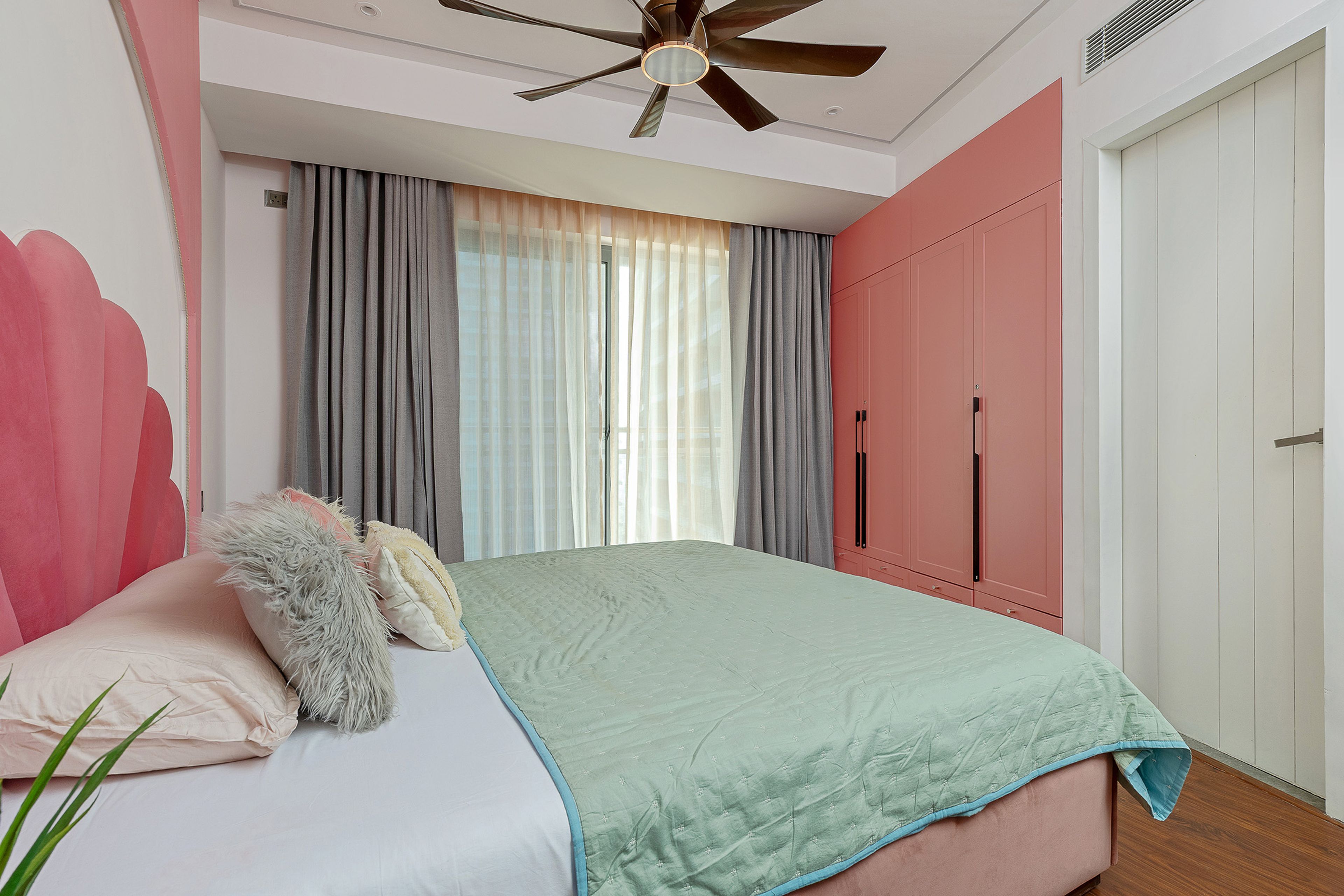 Bedroom Design with Pink 4-Door Swing Wardrobe