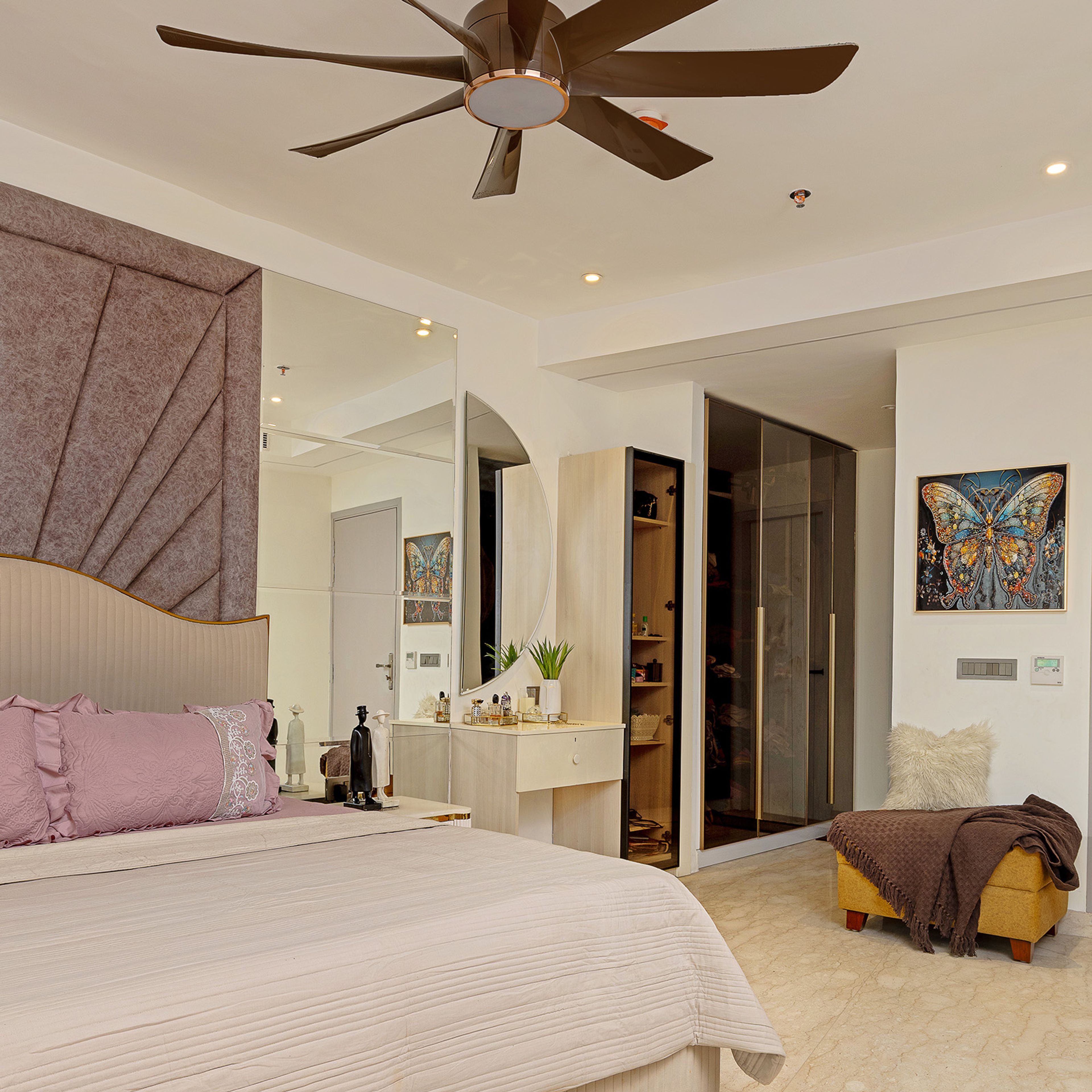 Bedroom Design with Mirrored Bedside Wall, Tall Unit and Crescent Moon Shaped Dressing Mirror