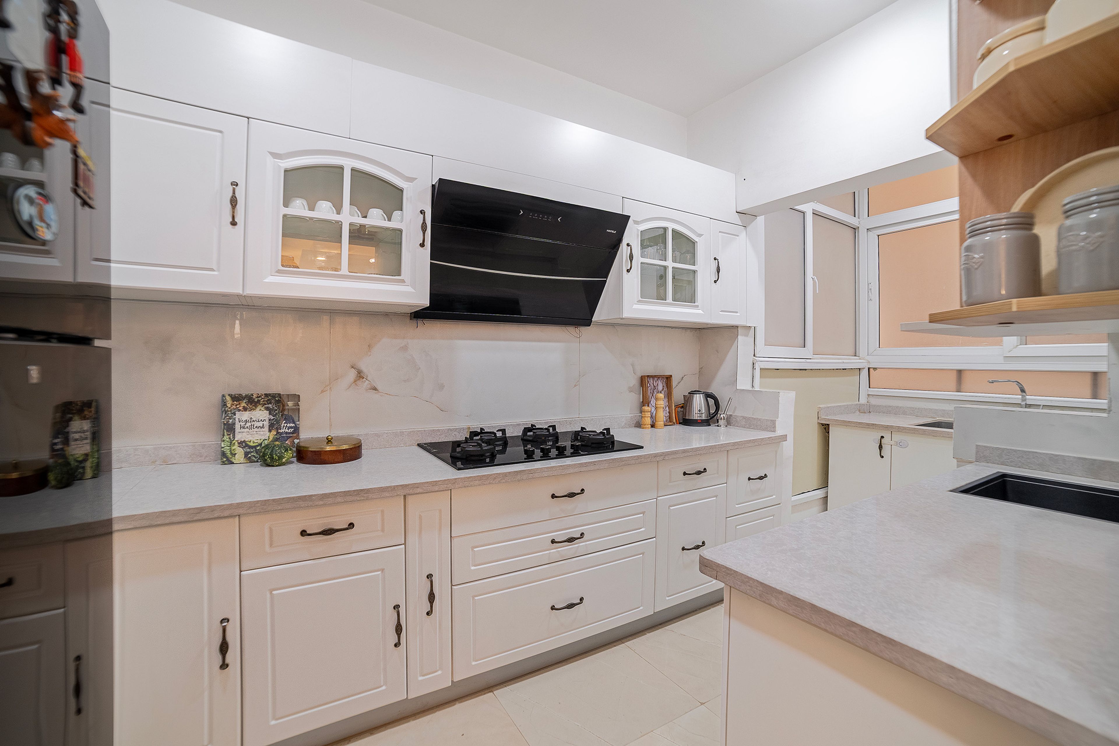 Parallel Kitchen Design with White Profile Shutter Units