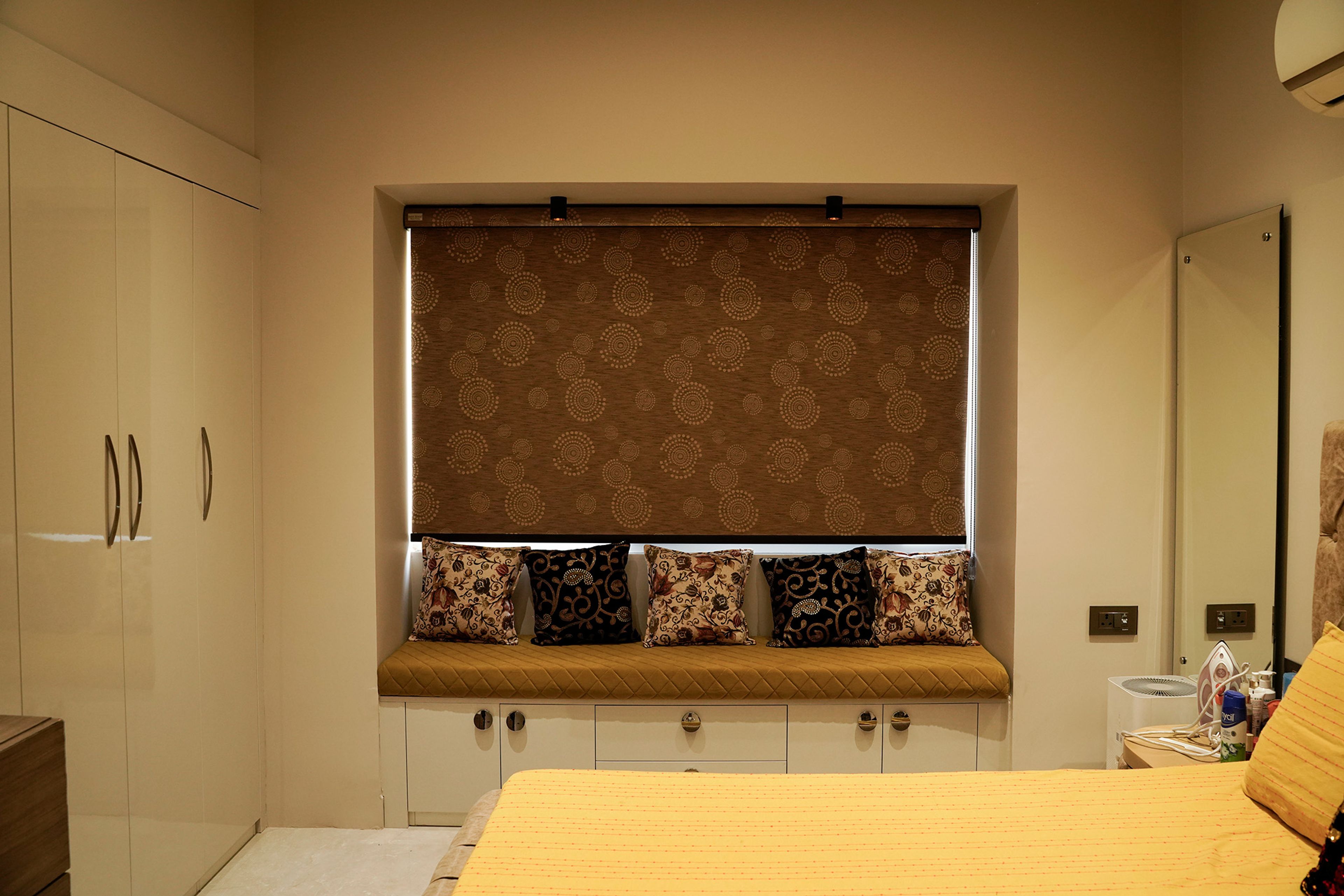 Bedroom design with beige 3-door swing wardrobe