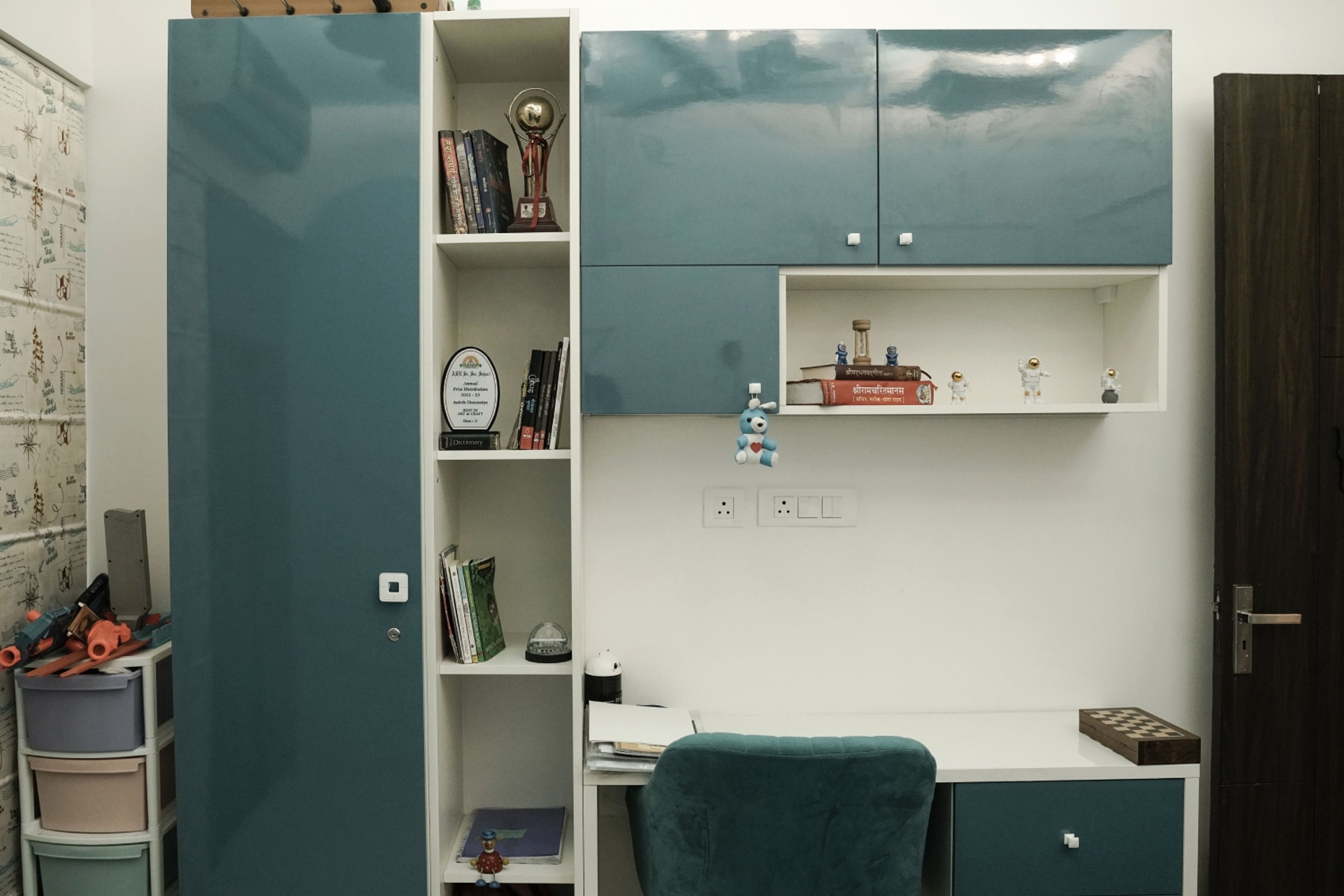 Teal and White Study Space with Attached Single Door Wardrobe and Open Tall Unit