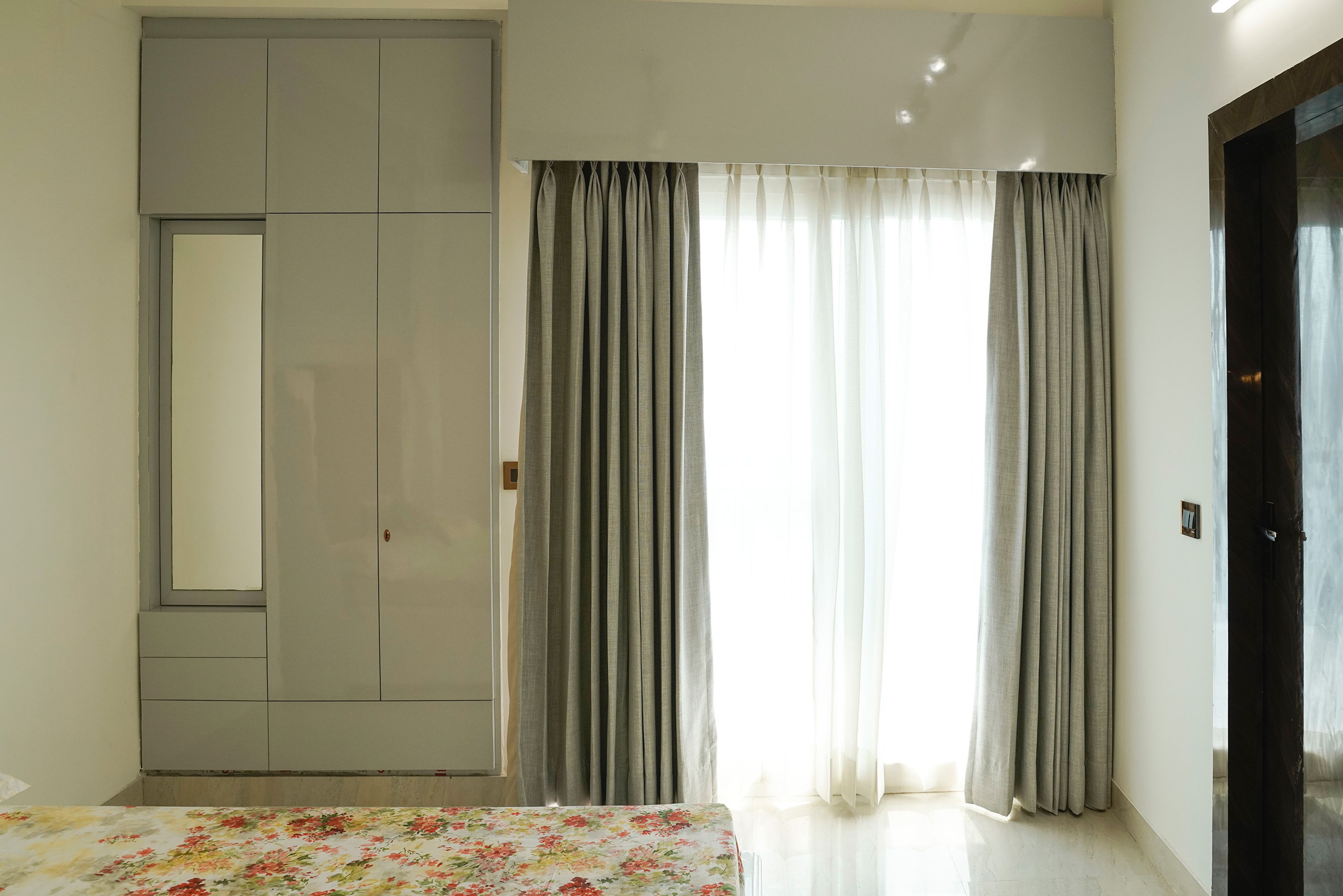 Bedroom design with 2-door grey swing wardrobe
