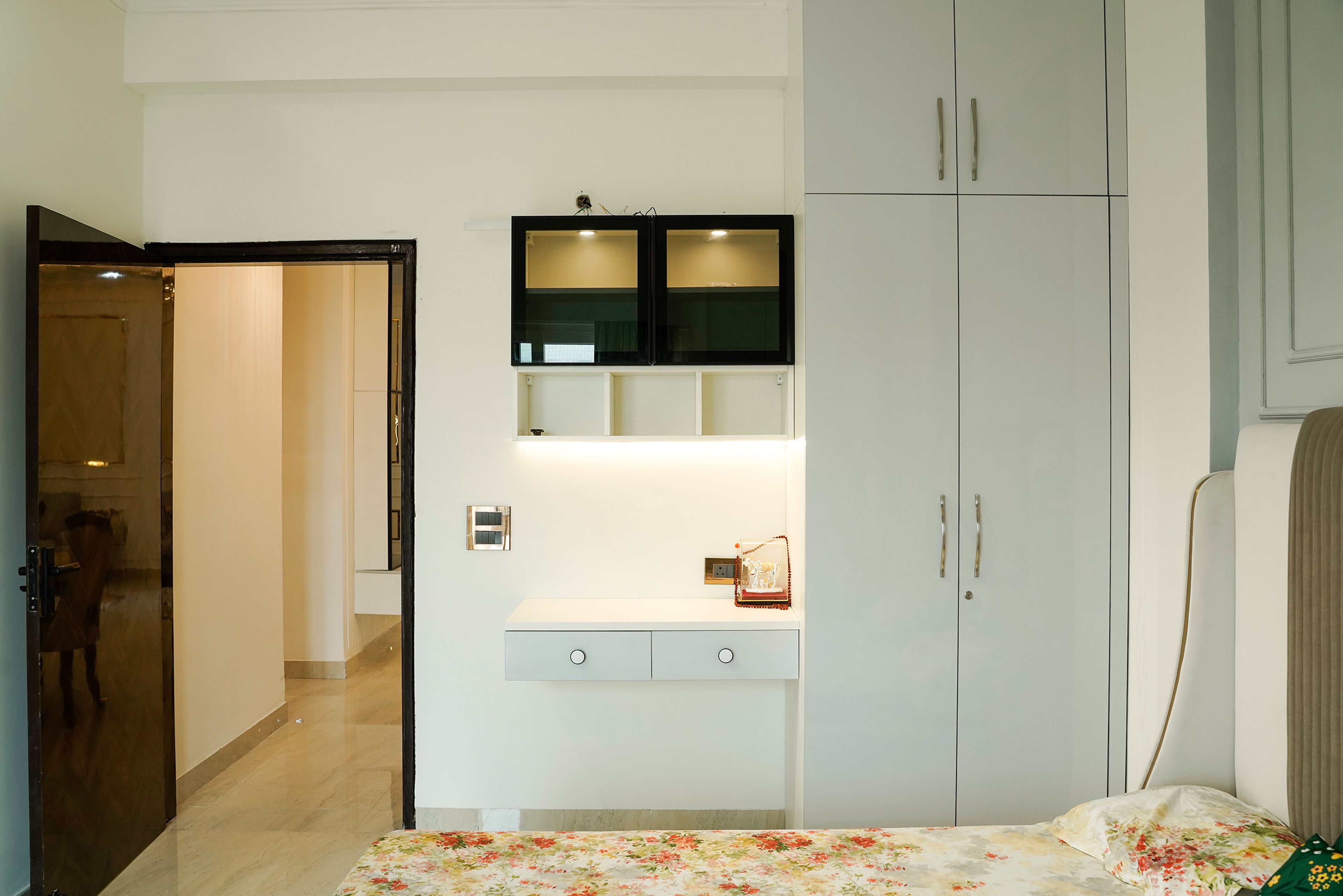 2-door grey swing wardrobe and study space