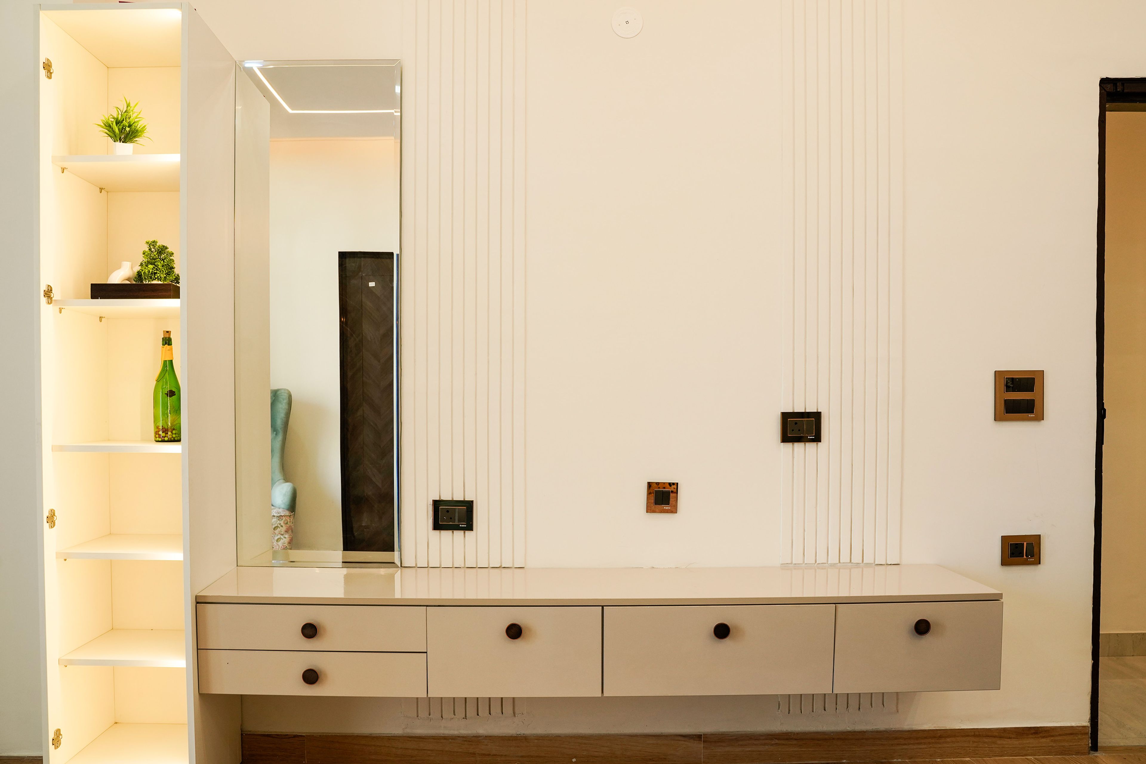 White TV unit design with beige drawers