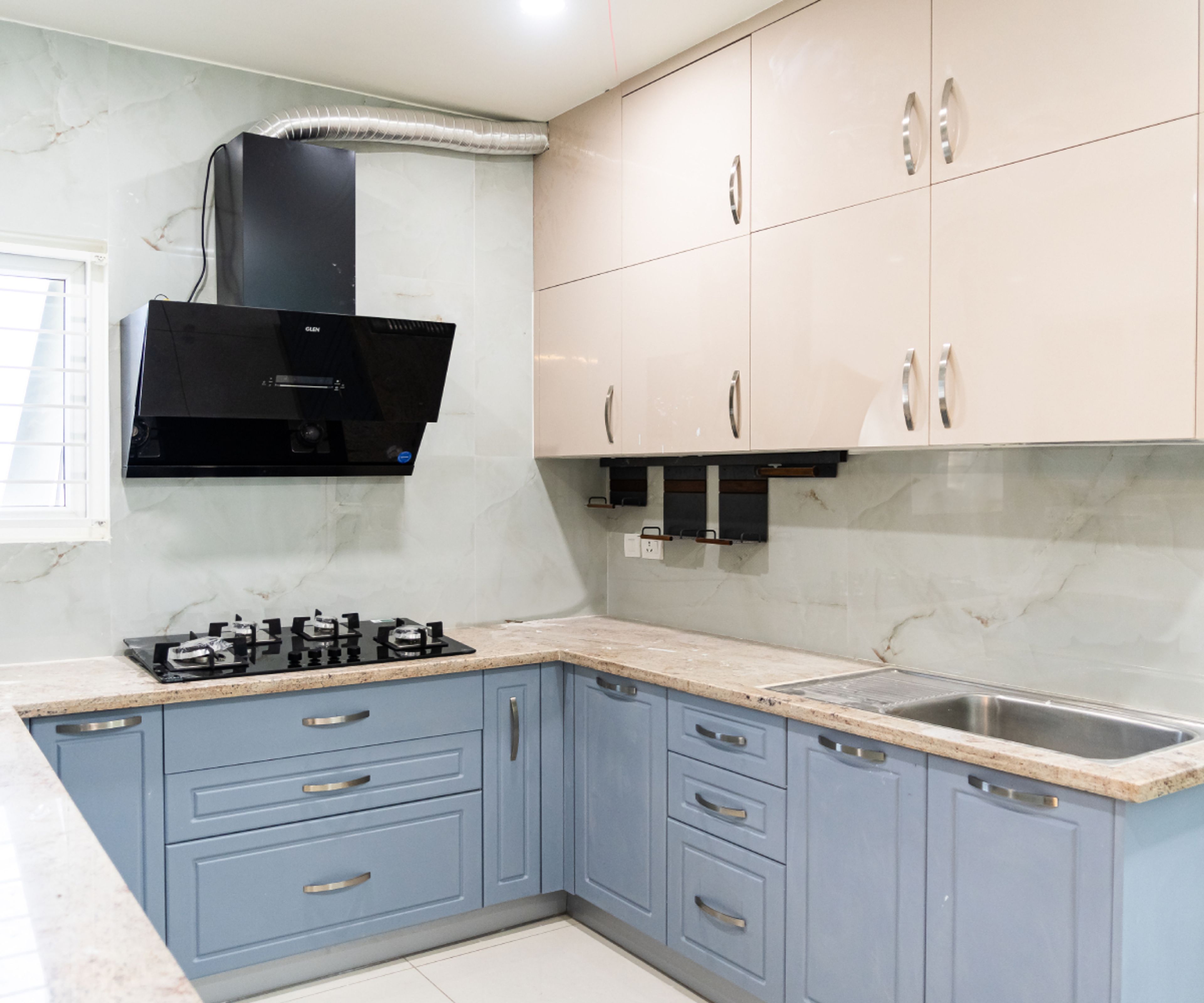 Soft Blue and Beige Modern U-Shaped Kitchen Design With Quartz Counter