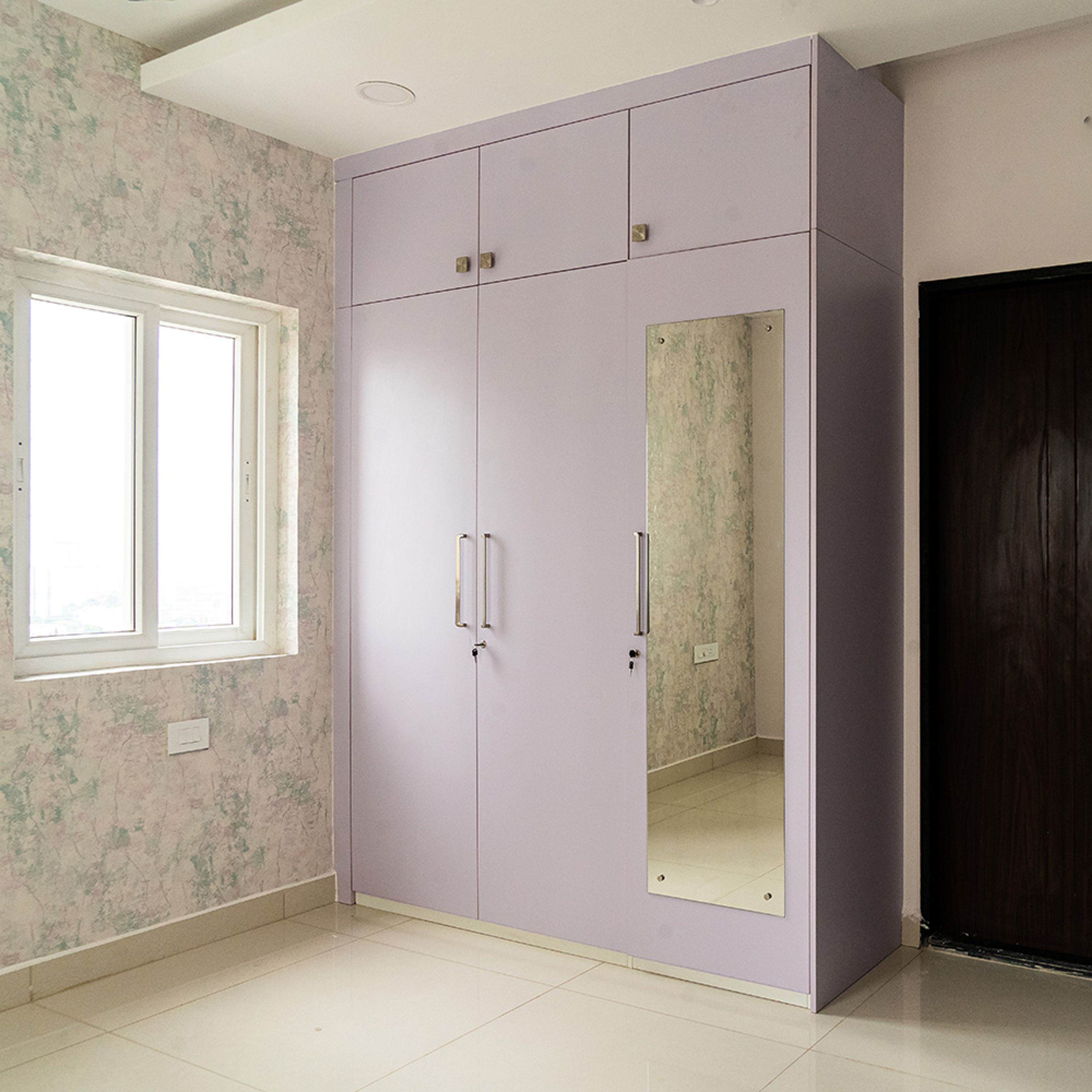 Lavender 3-Door Swing Wardrobe Design with Integrated Mirror