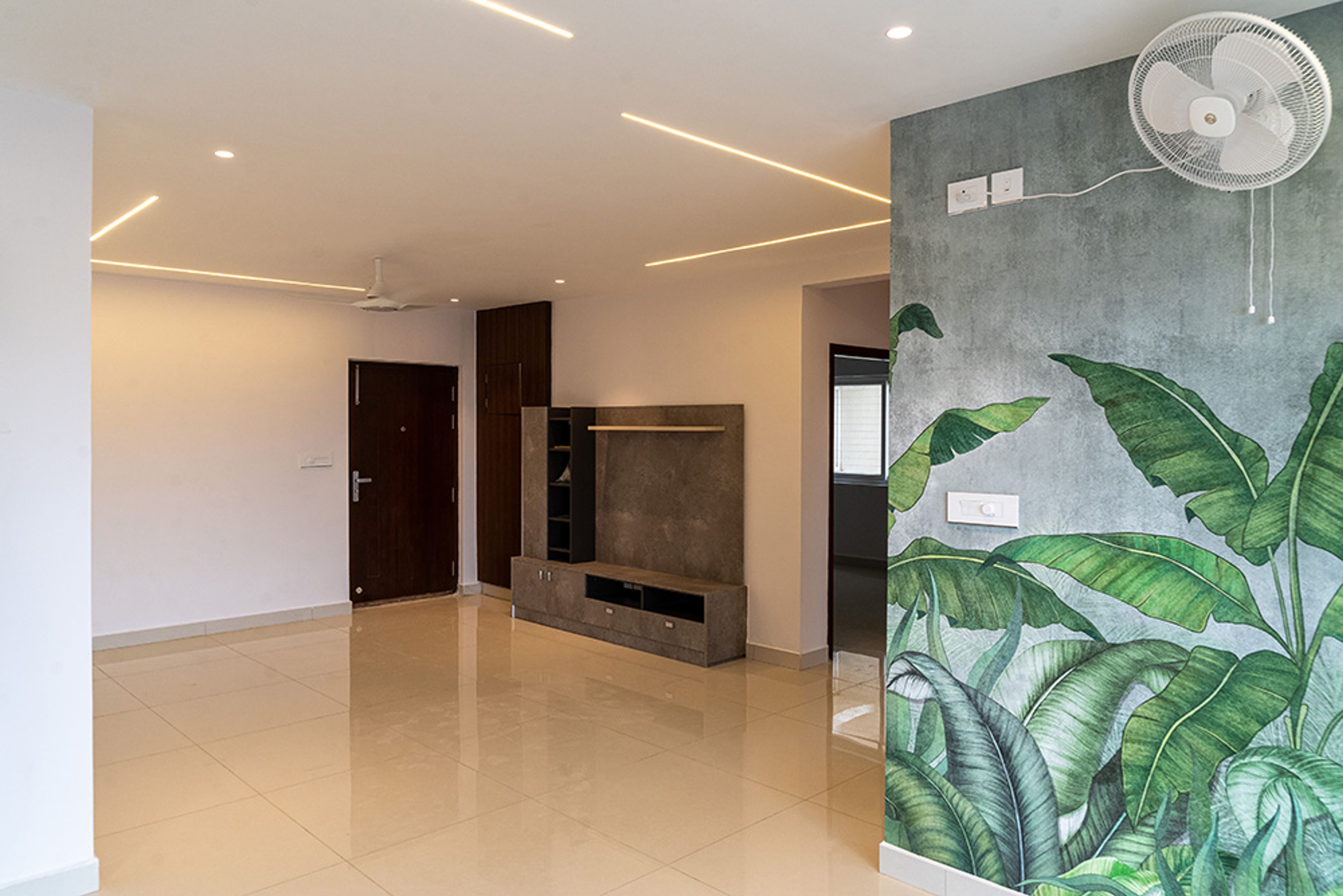 Living Room Design with Green Tropical Themed Wallpaper