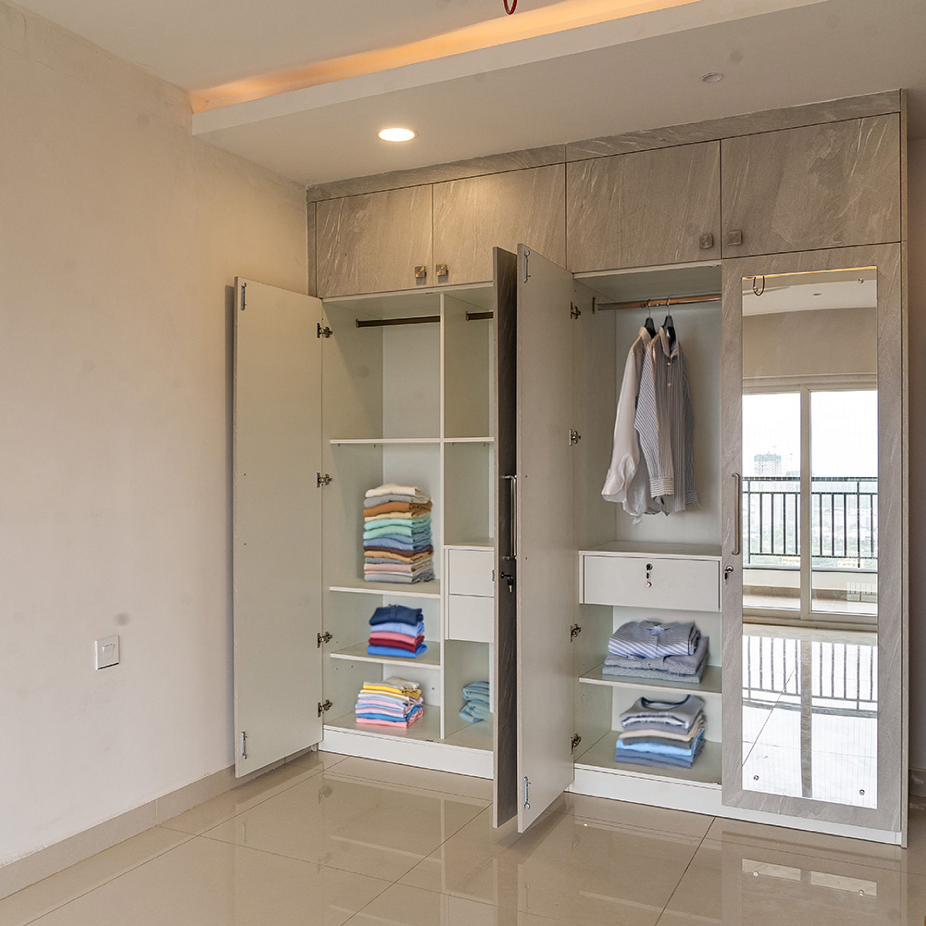 Beige YTextured 4-Door Swing Wardrobe Design with Integrated Mirror