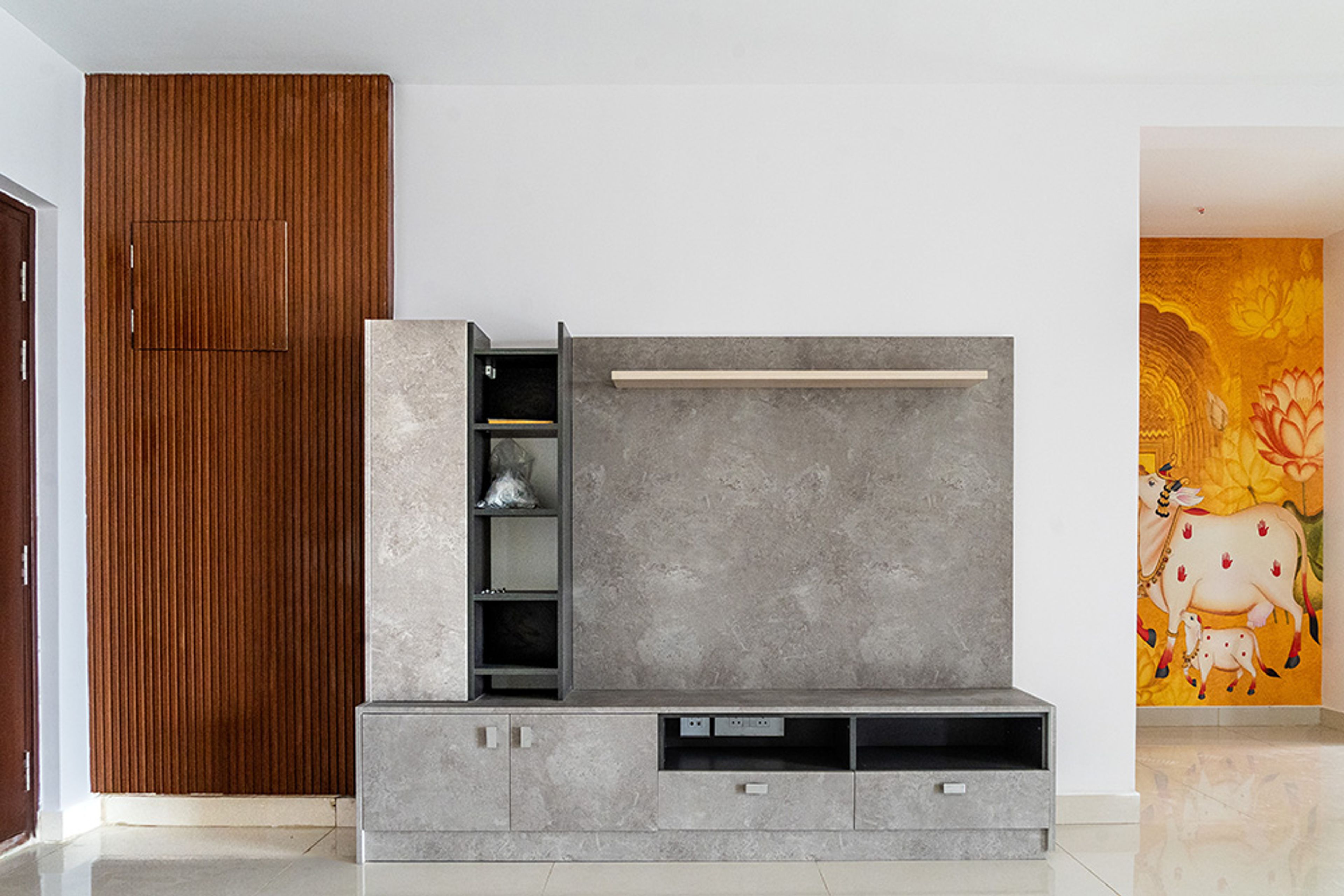 TV Unit Design with Grey Marble Patterned Backsplash and Drawers