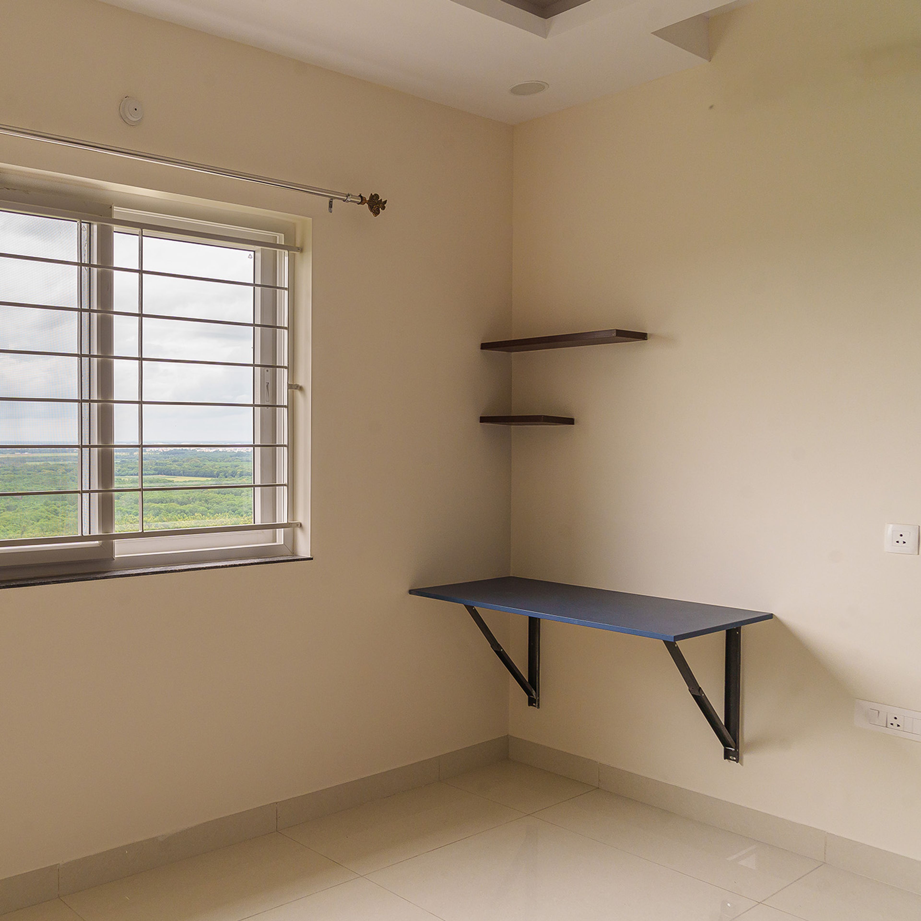 Study Space with Wall Mounted Desk and Open Shelves