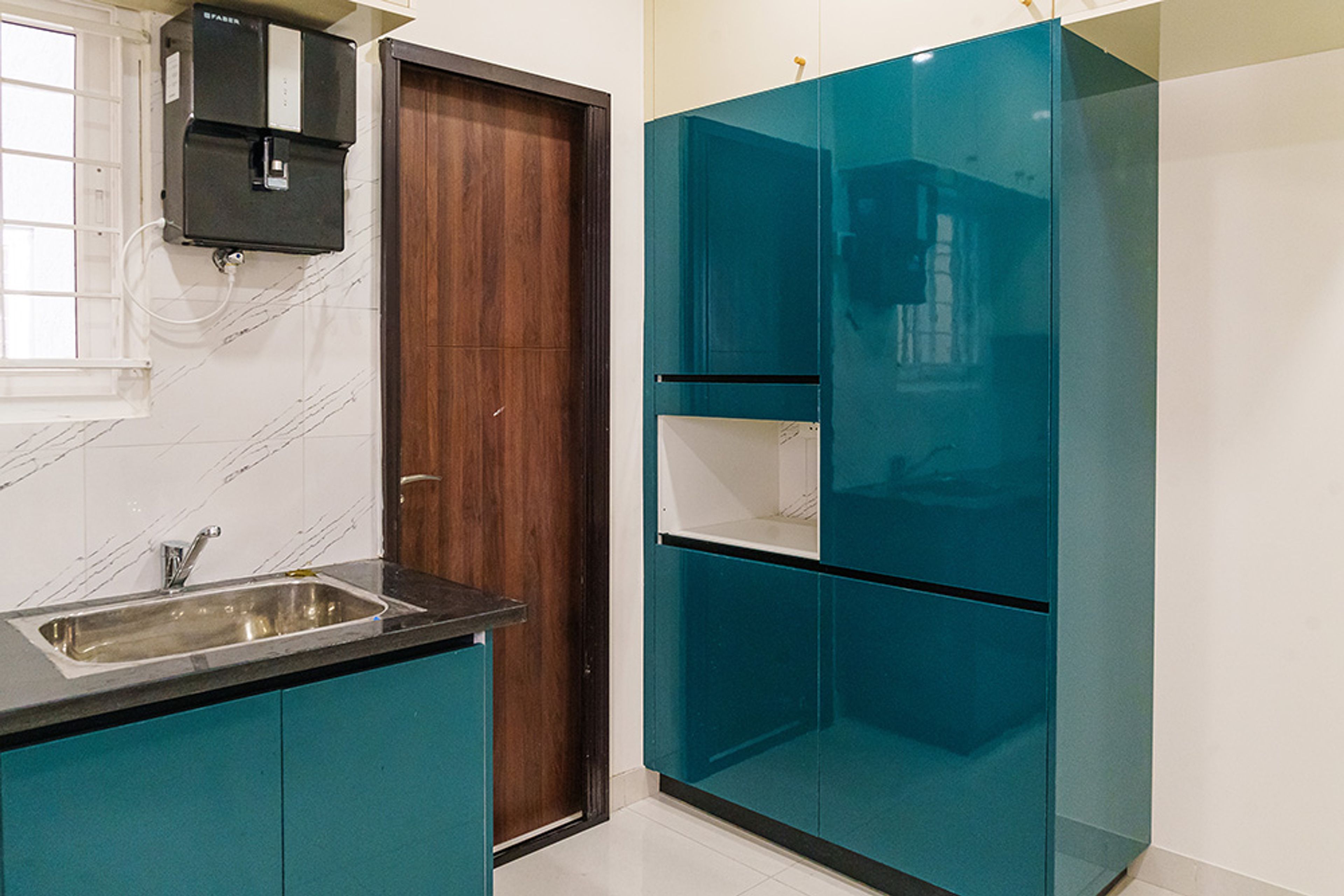 Kitchen Design with Teal Tall Unit