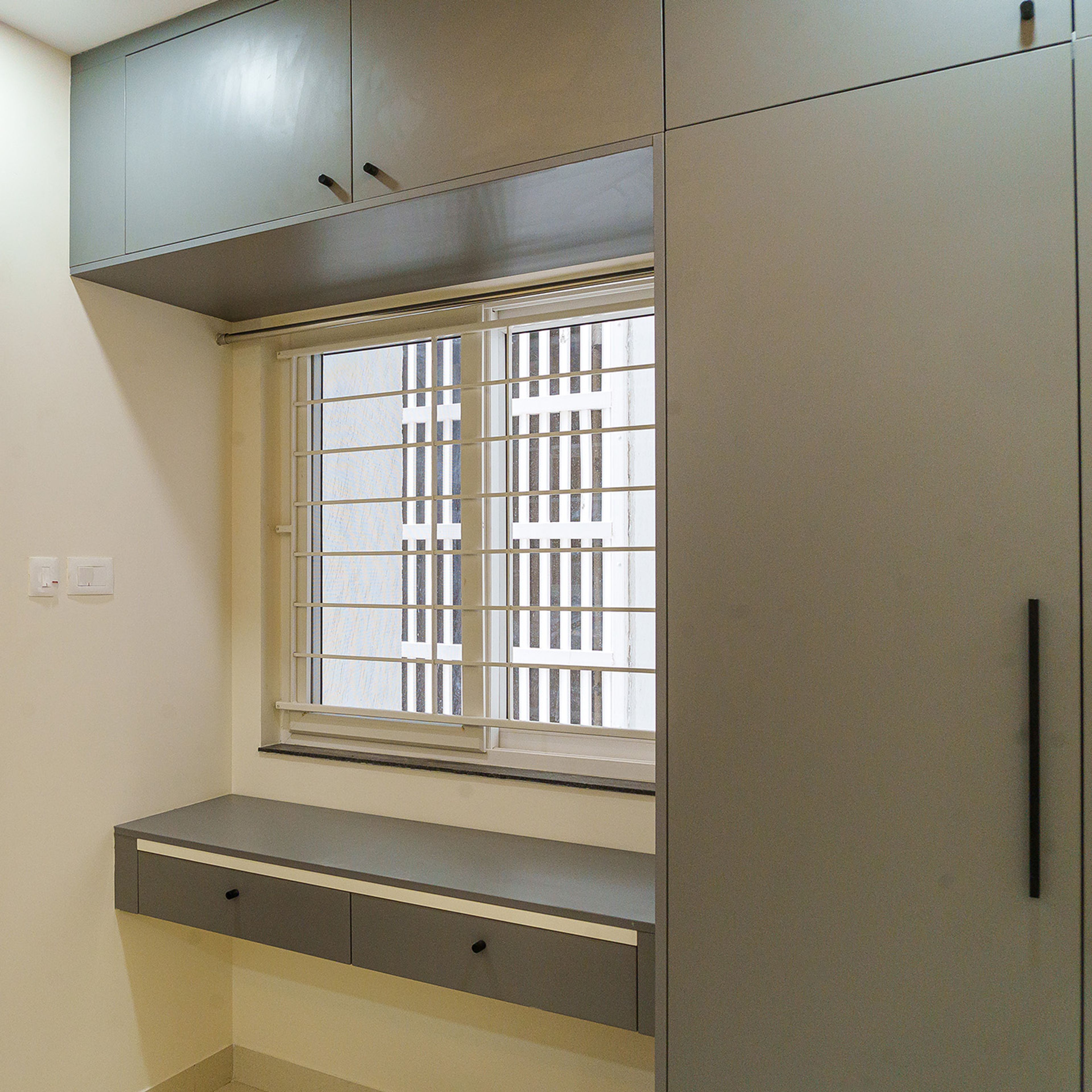 Grey Swing Wardrobe Design with Study Space