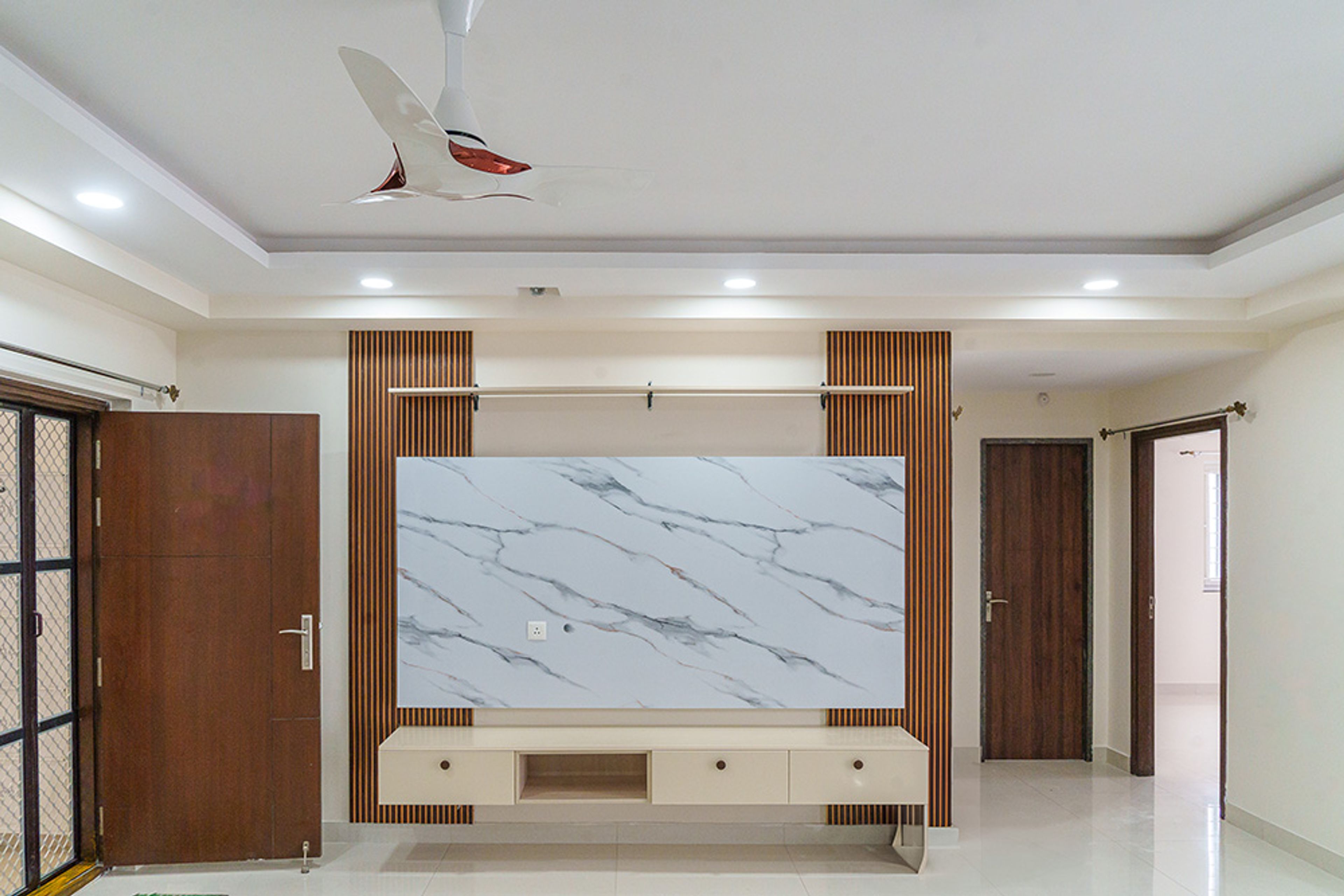 TV Unit Design with Fluted Wall Panel and Marble Backsplash