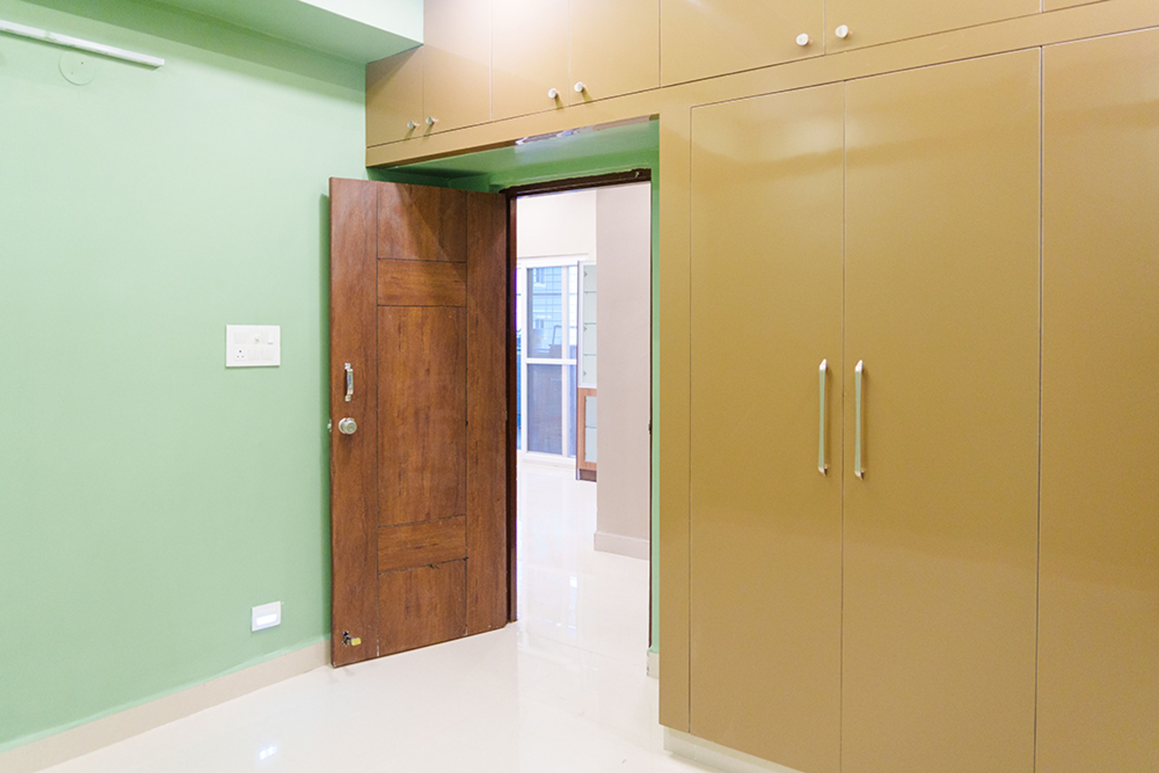 3-Door Yellow Swing Wardrobe Design with Loft Unit