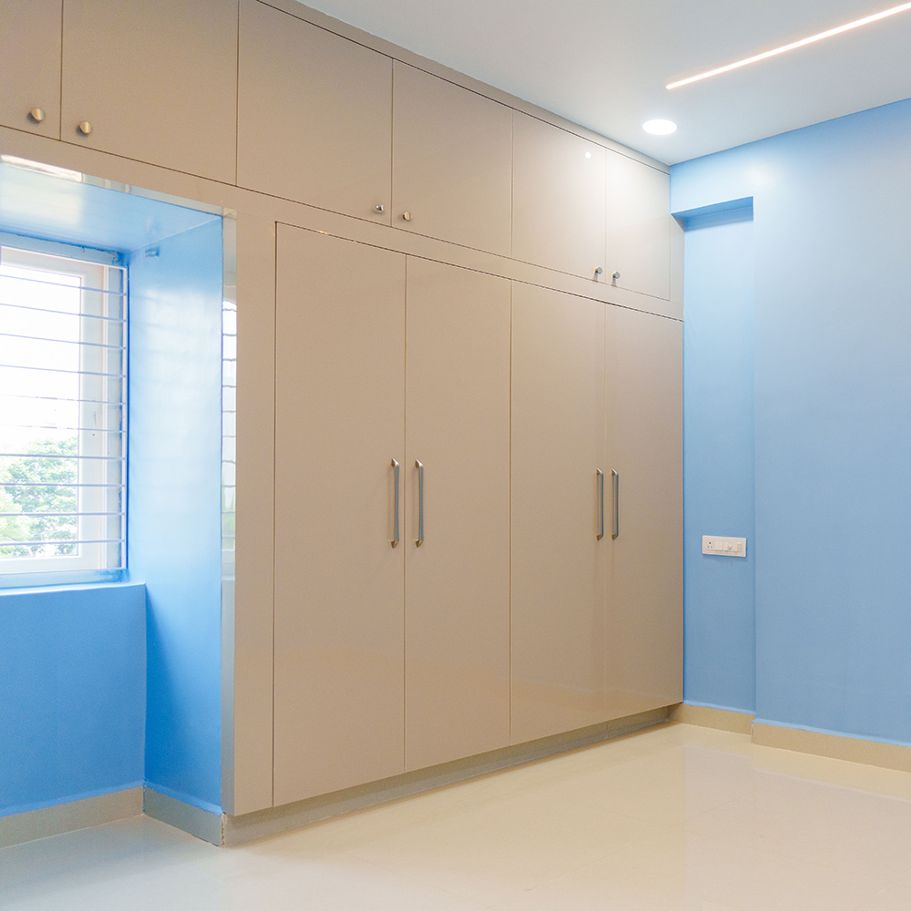 4-Door Beige Swing Wardrobe Design with Loft Unit