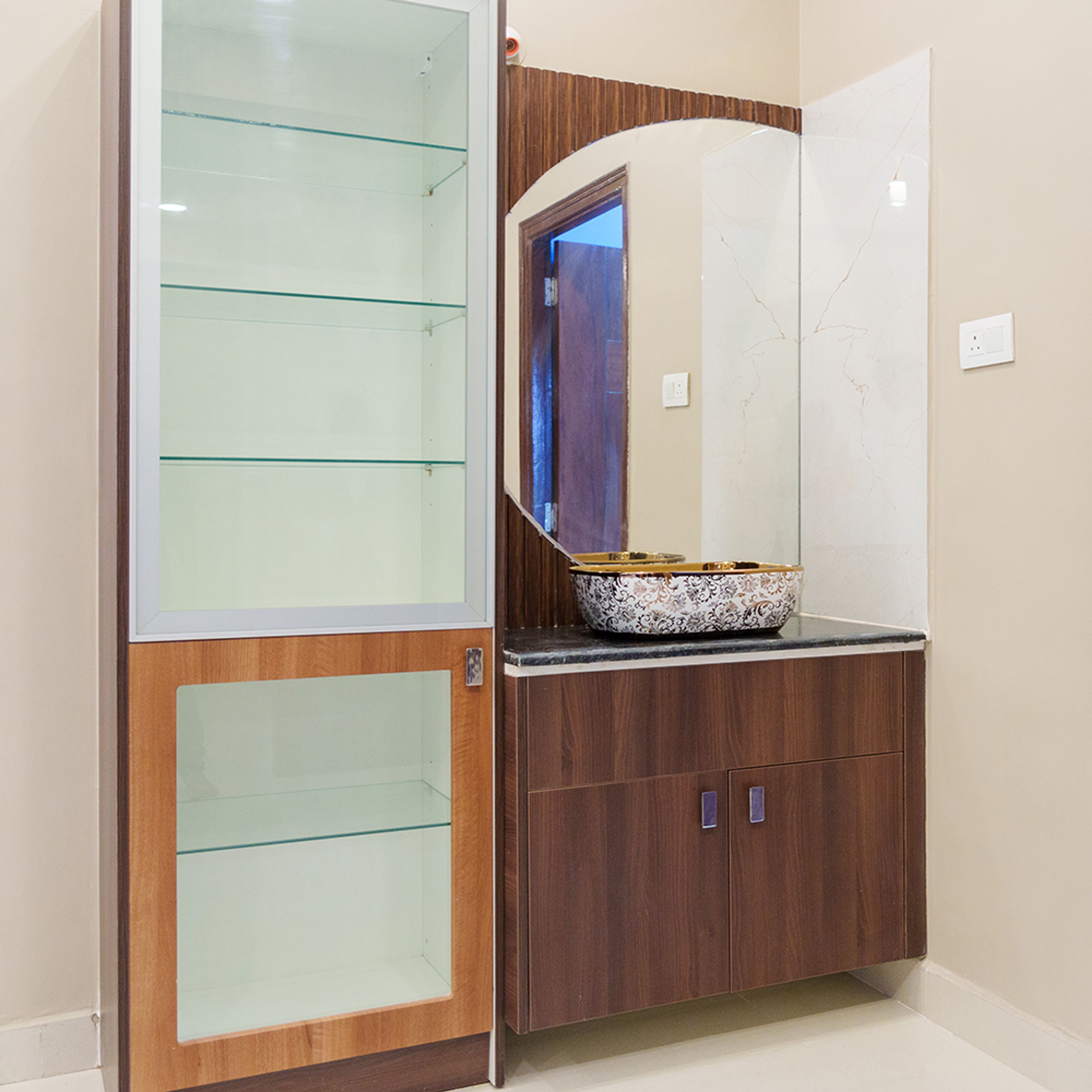 Crockery Unit Design with Glass Shutter Tall Unit and a Cabinet with Designer Sink