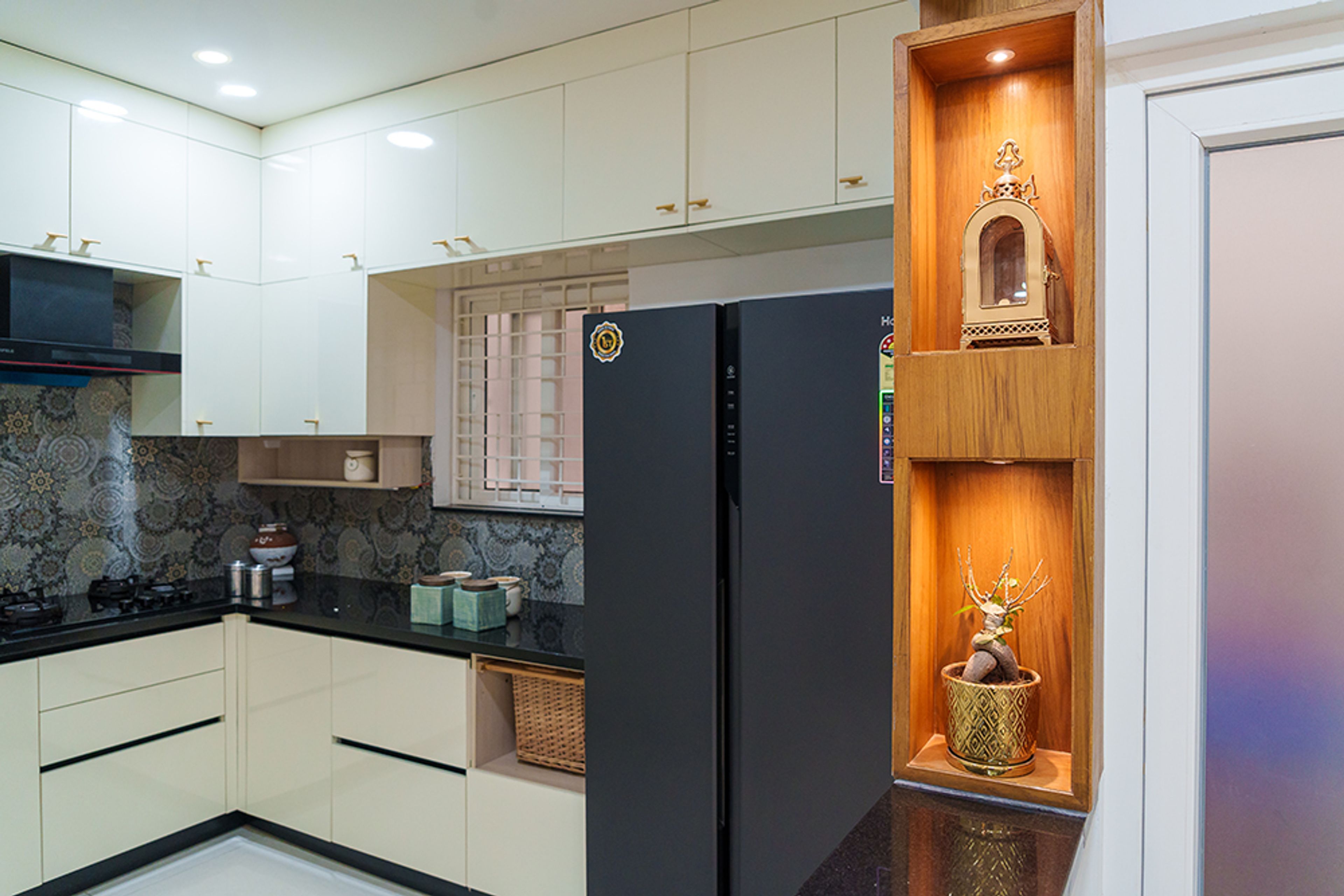 L-shaped kitchen design with wooden display unit
