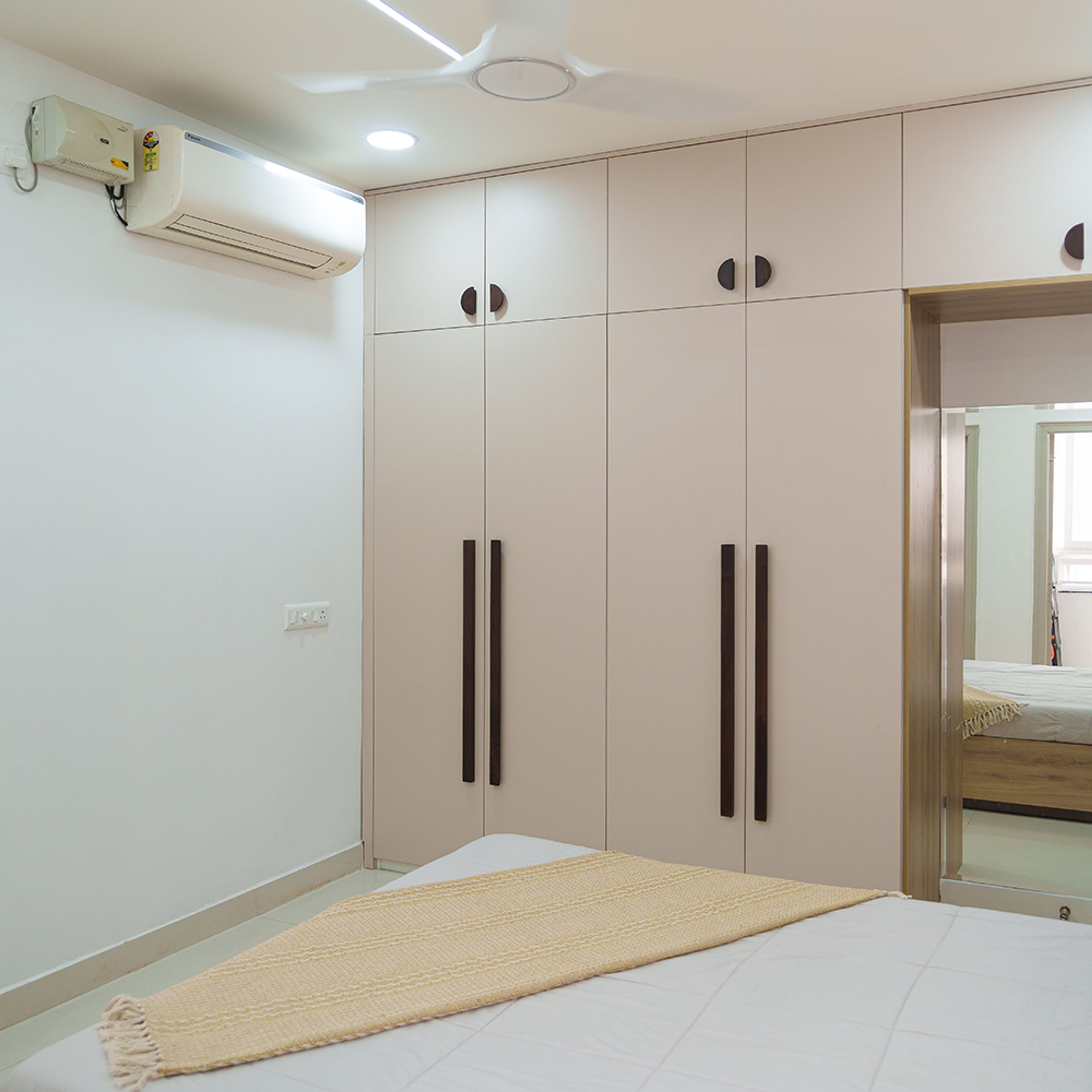 4-door beige swing wardrobe design