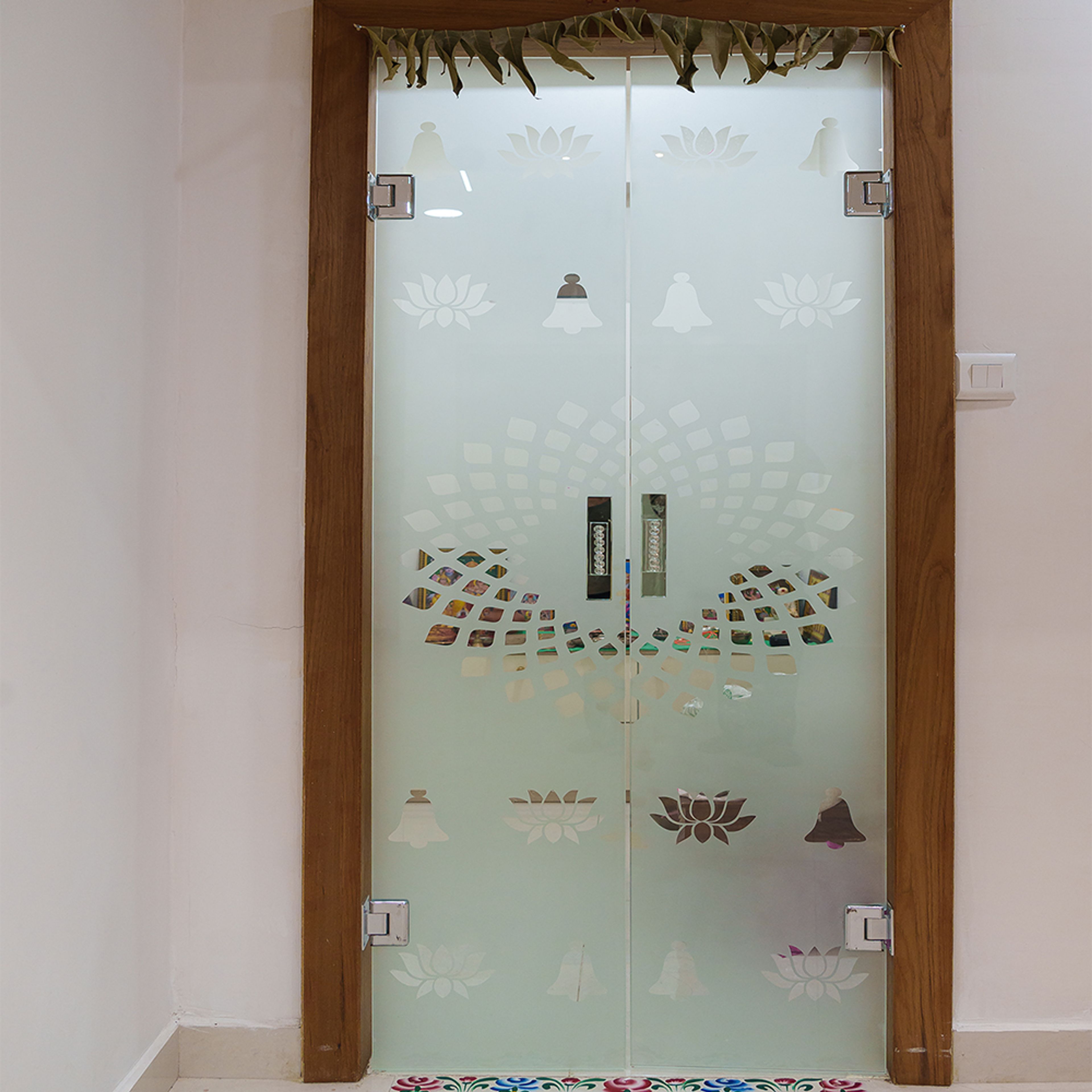 Pooja unit design with glass door