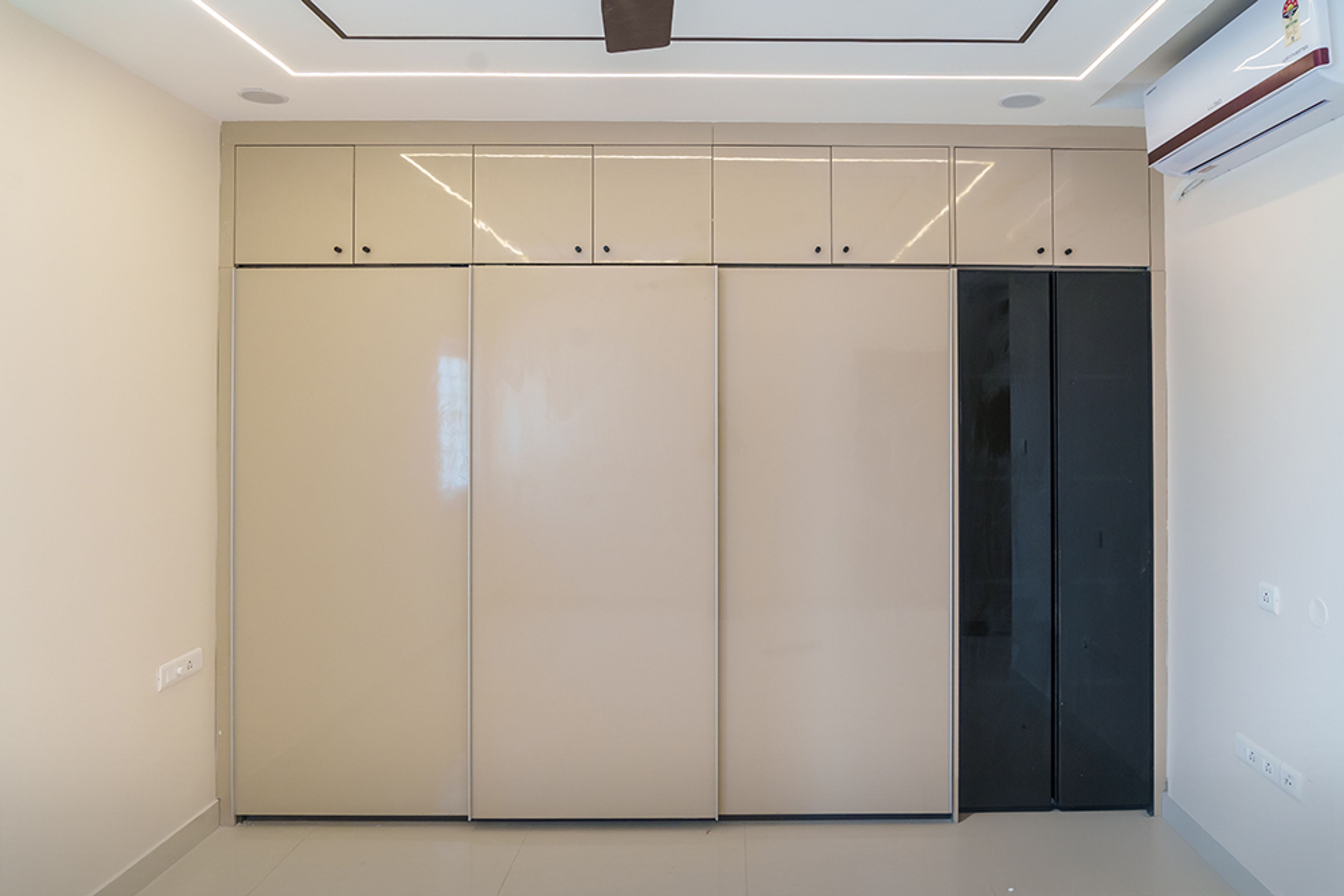 3-Door Cream Sliding Wardrobe with 2-Door Balck Tinted Glass Shutter Swing Wardrobe