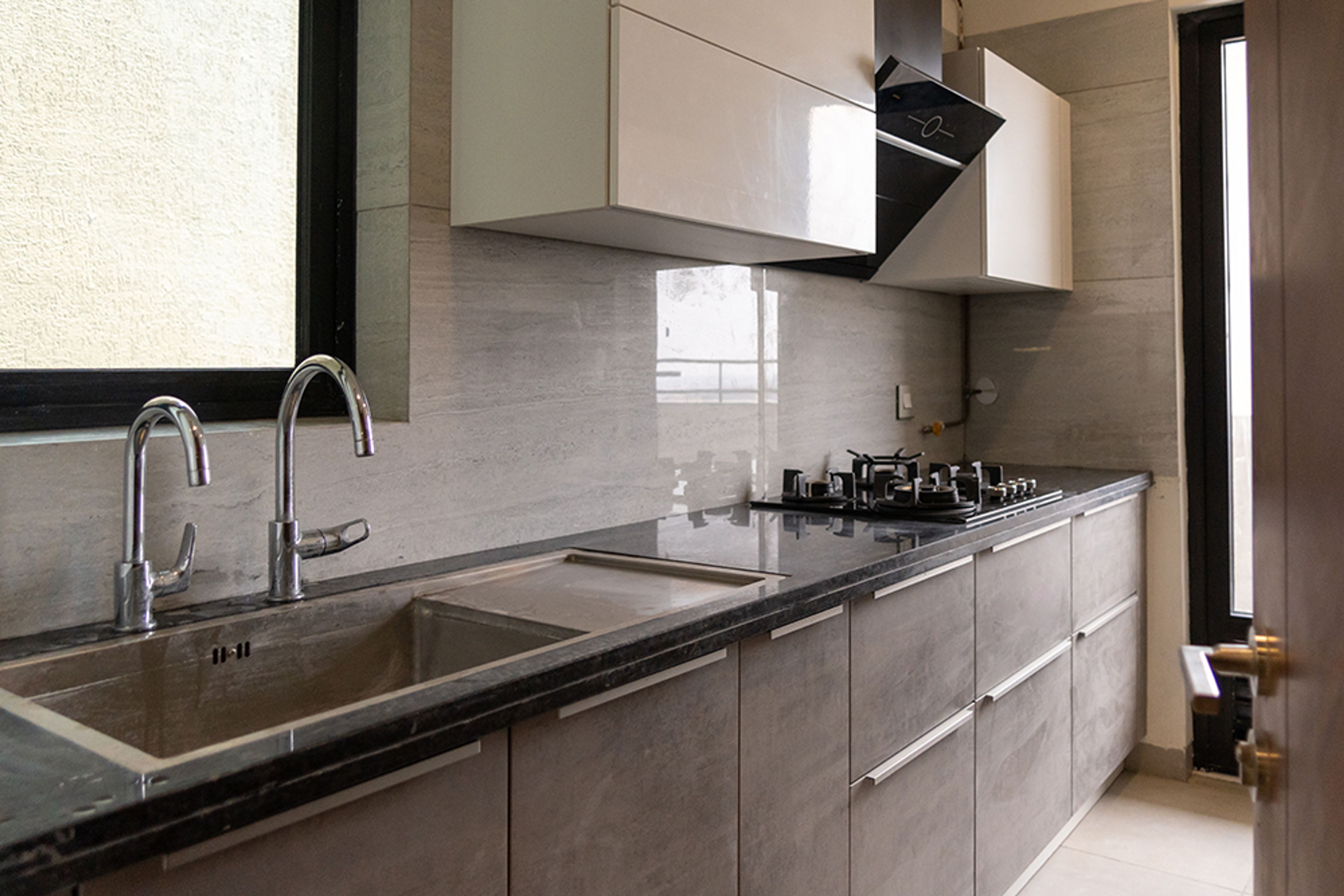 Contemporary L-Shaped Kitchen Design With Grey Storage Cabinets