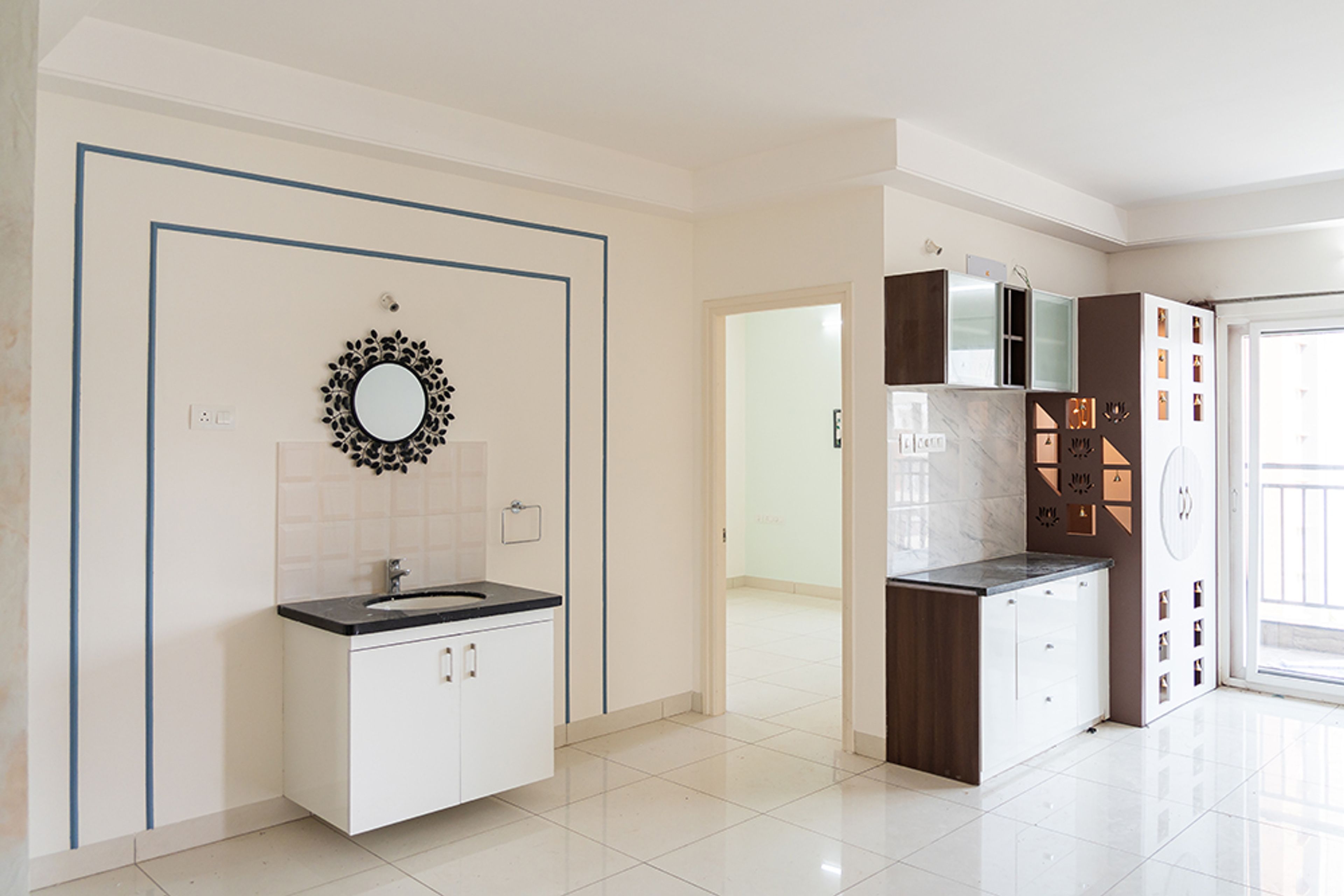Living room design with pooja unit, TV unit and wash area
