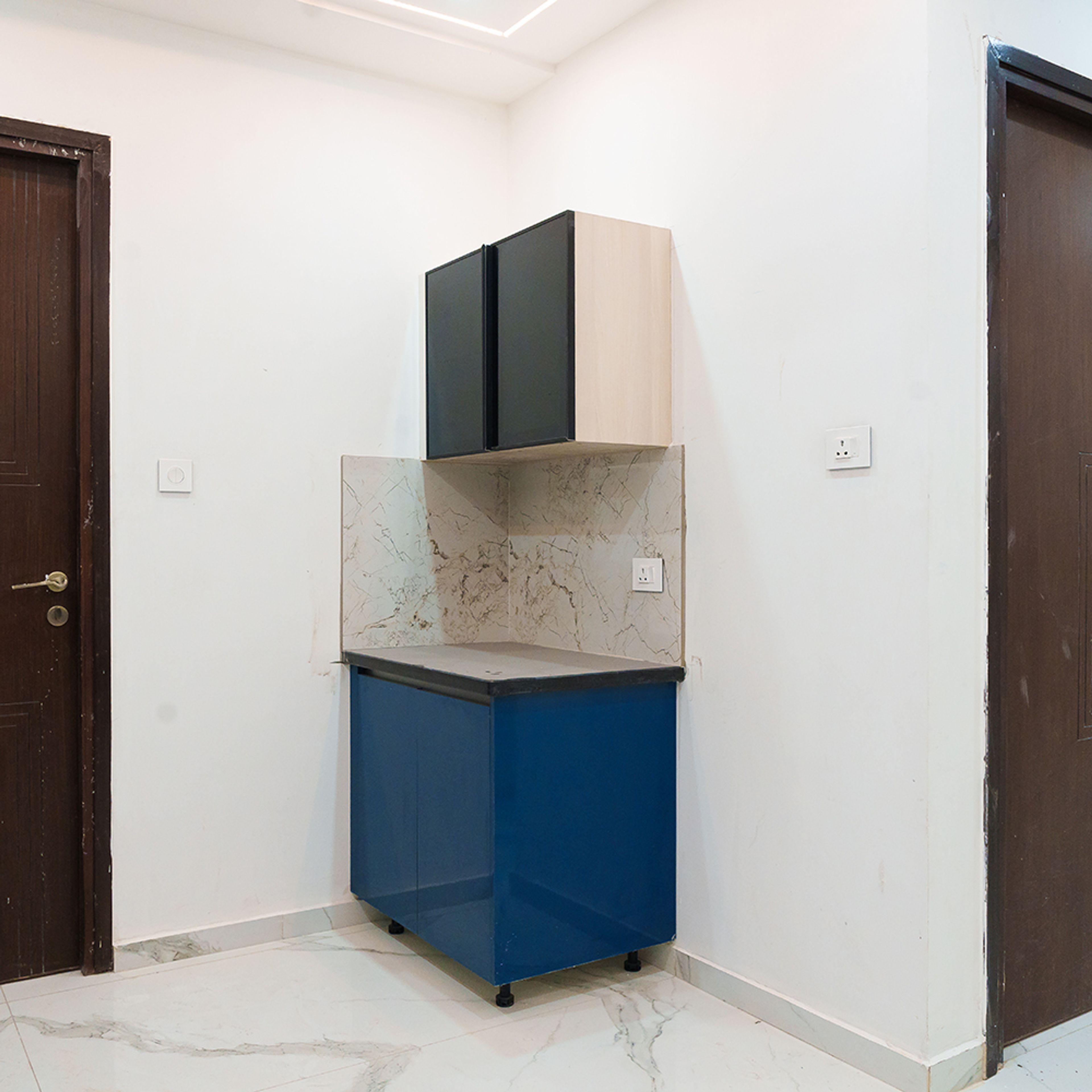 Small crockery unit with blue and glass shutter cabinets