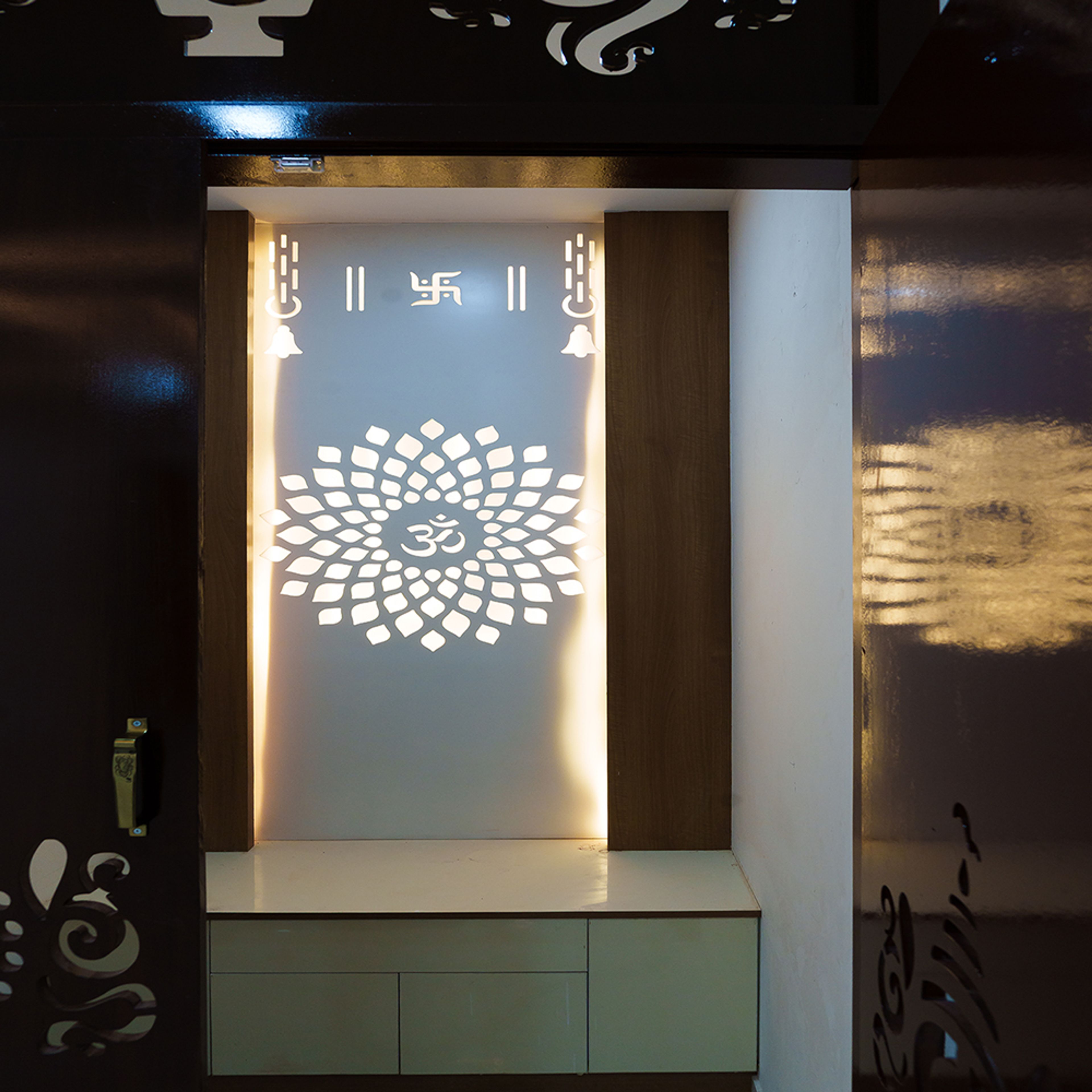 Pooja unit with backlit om engraving
