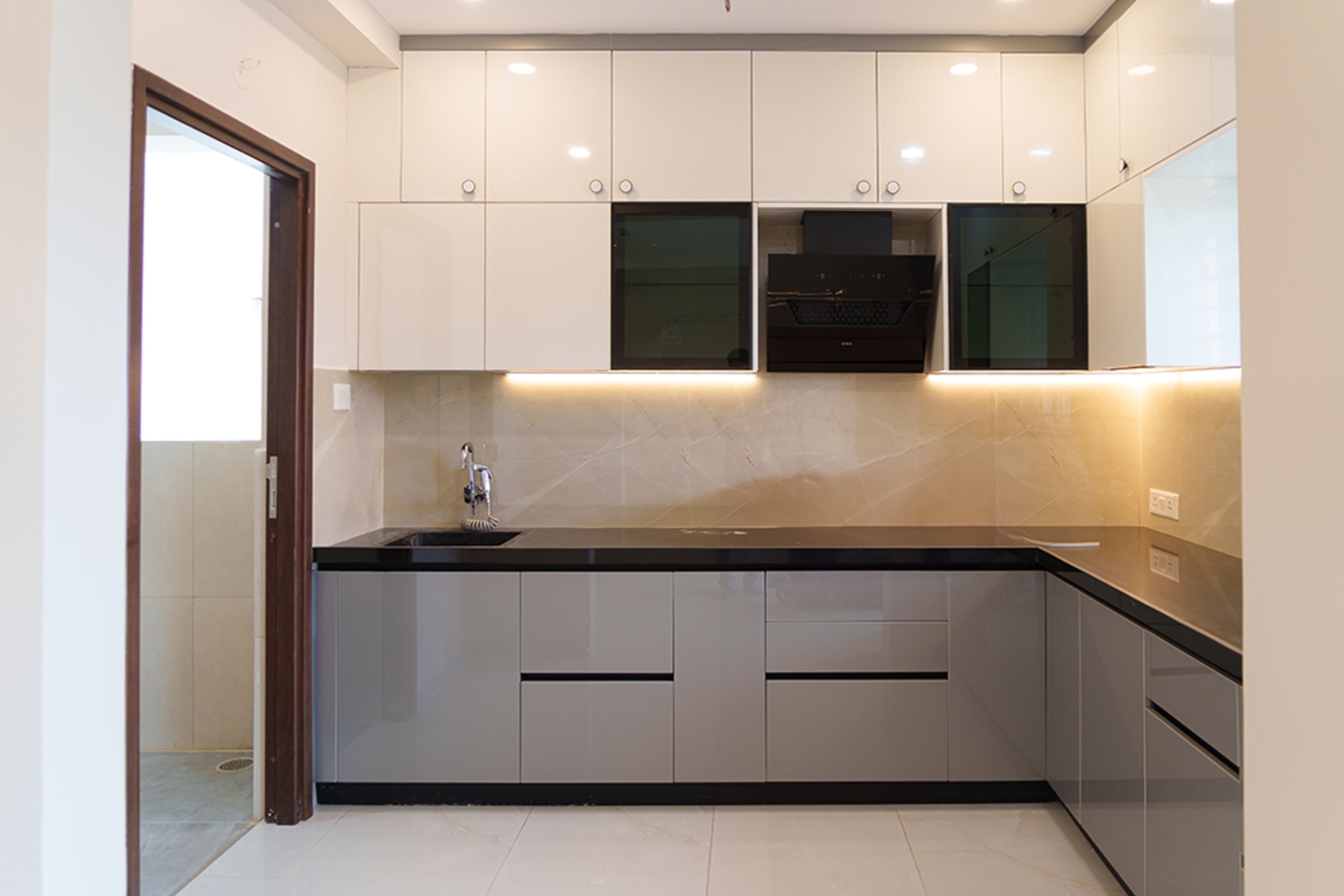 Straight Kitchen Design with Grey and Beige Units and Under Cabinet Lighting