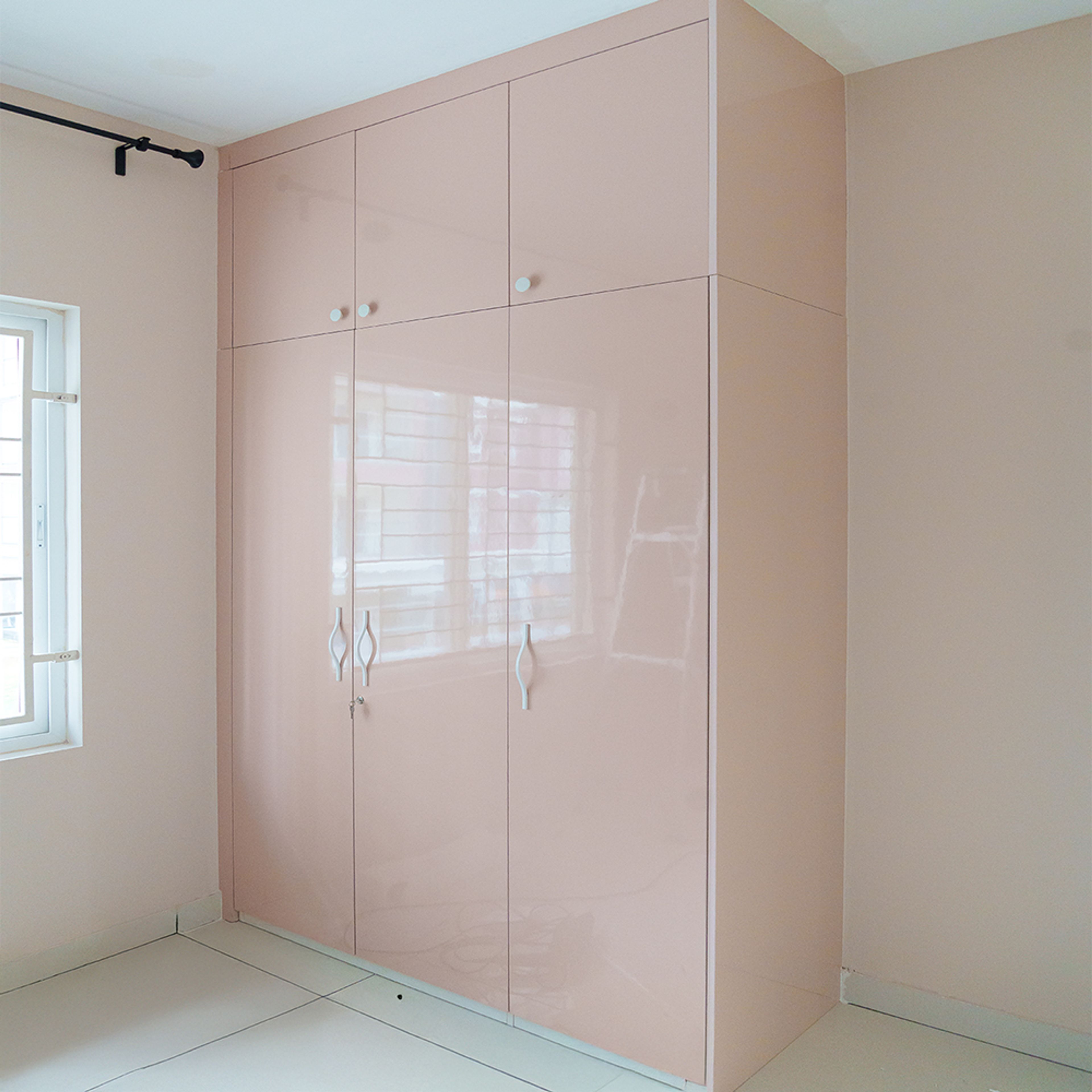 3-Door Light Pink Swing Wardrobe Design and Loft Unit
