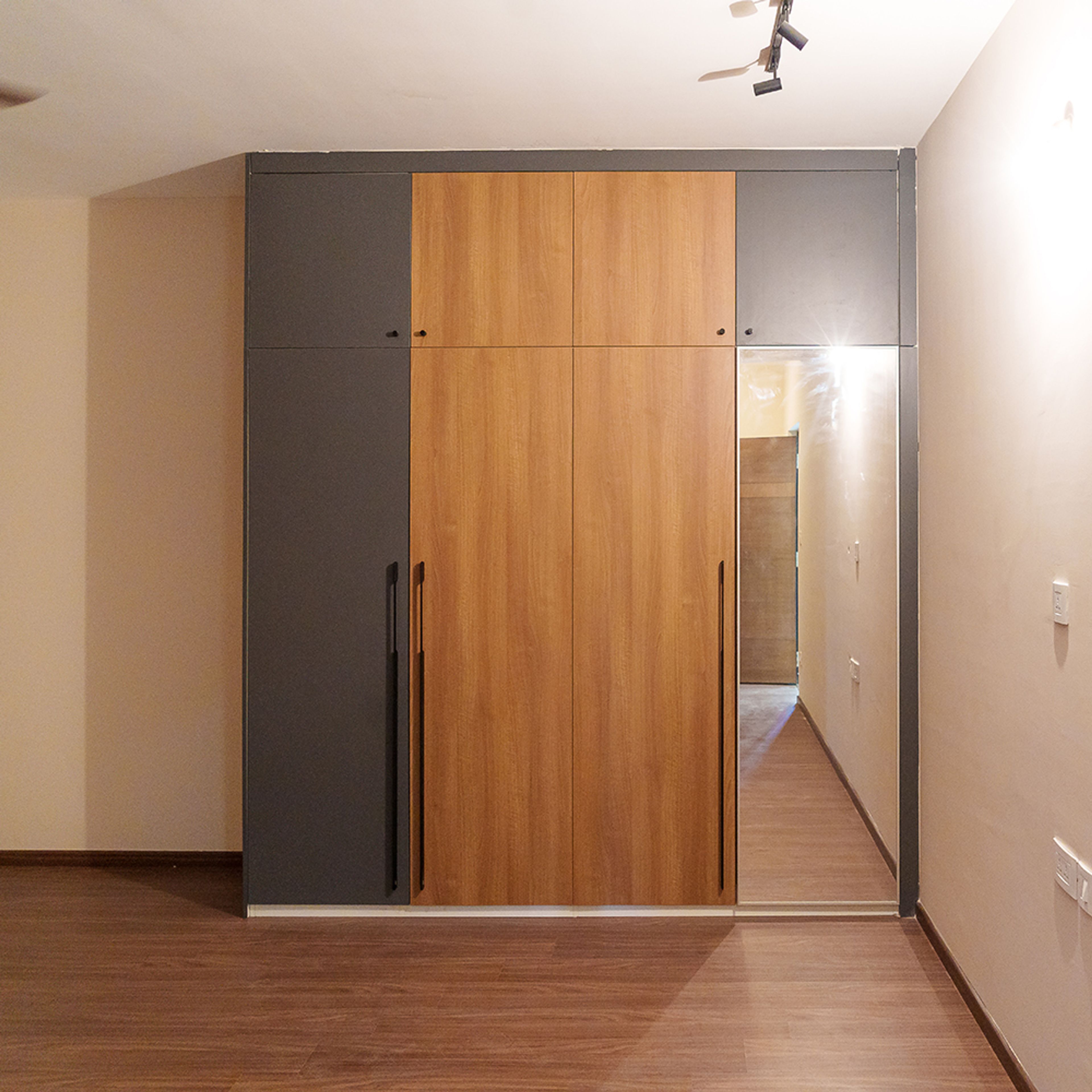 4-Door Grey and Wood Swing Wardrobe Design with Integrated Mirror