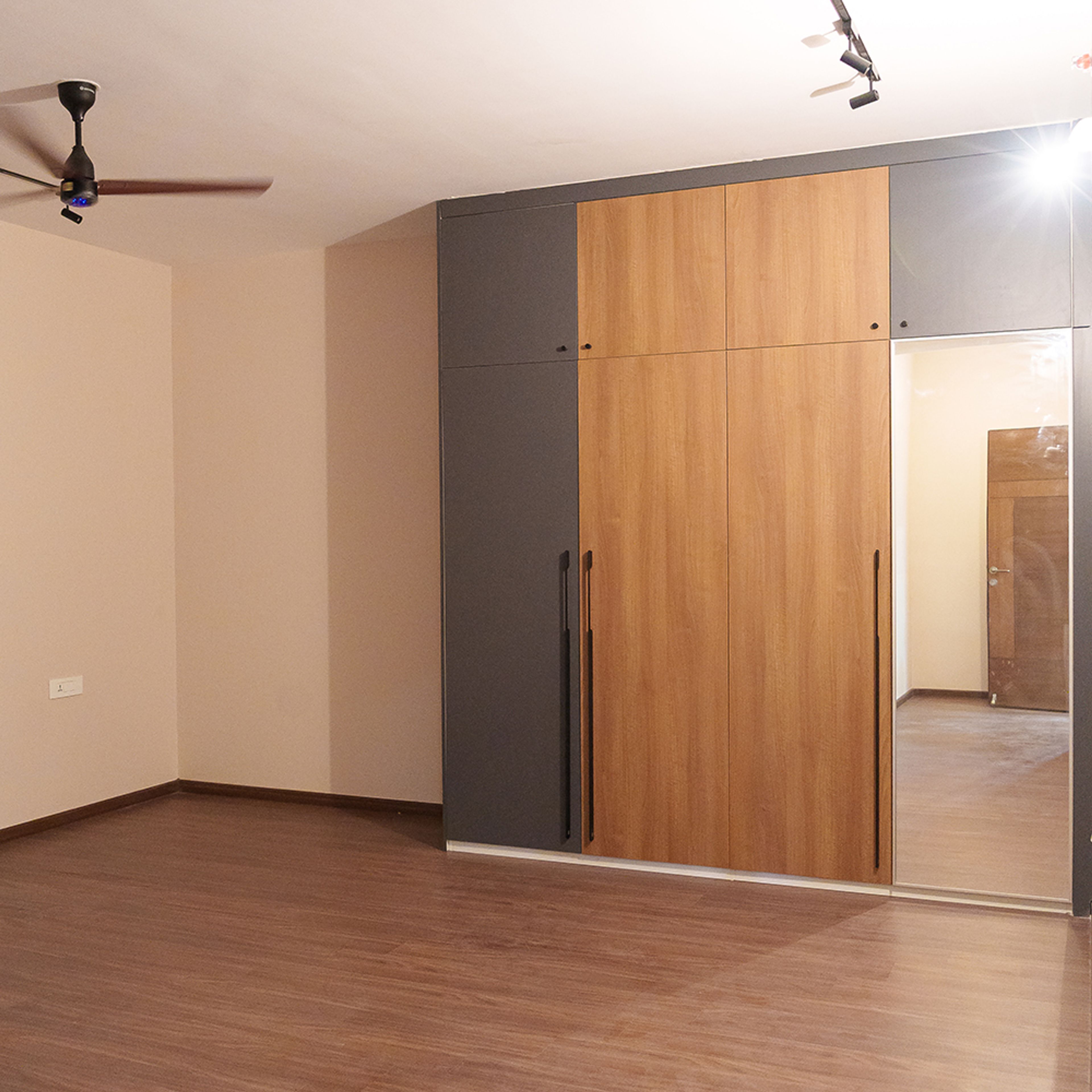 4-Door Grey and Wood Swing Wardrobe Design with Integrated Mirror