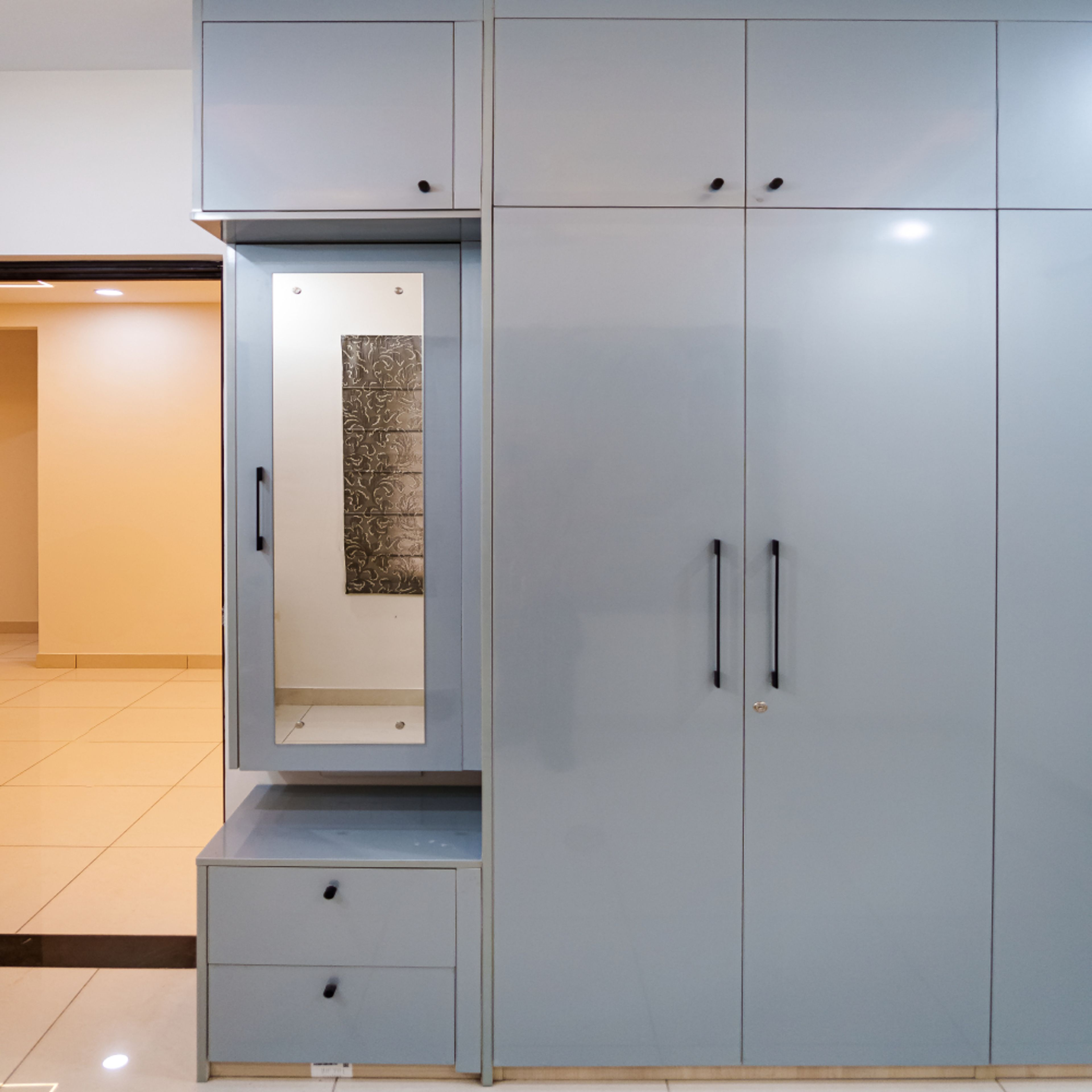 Powder Blue 4-Door Swing Wardrobe Design and Attached Dressing Unit with Mirror