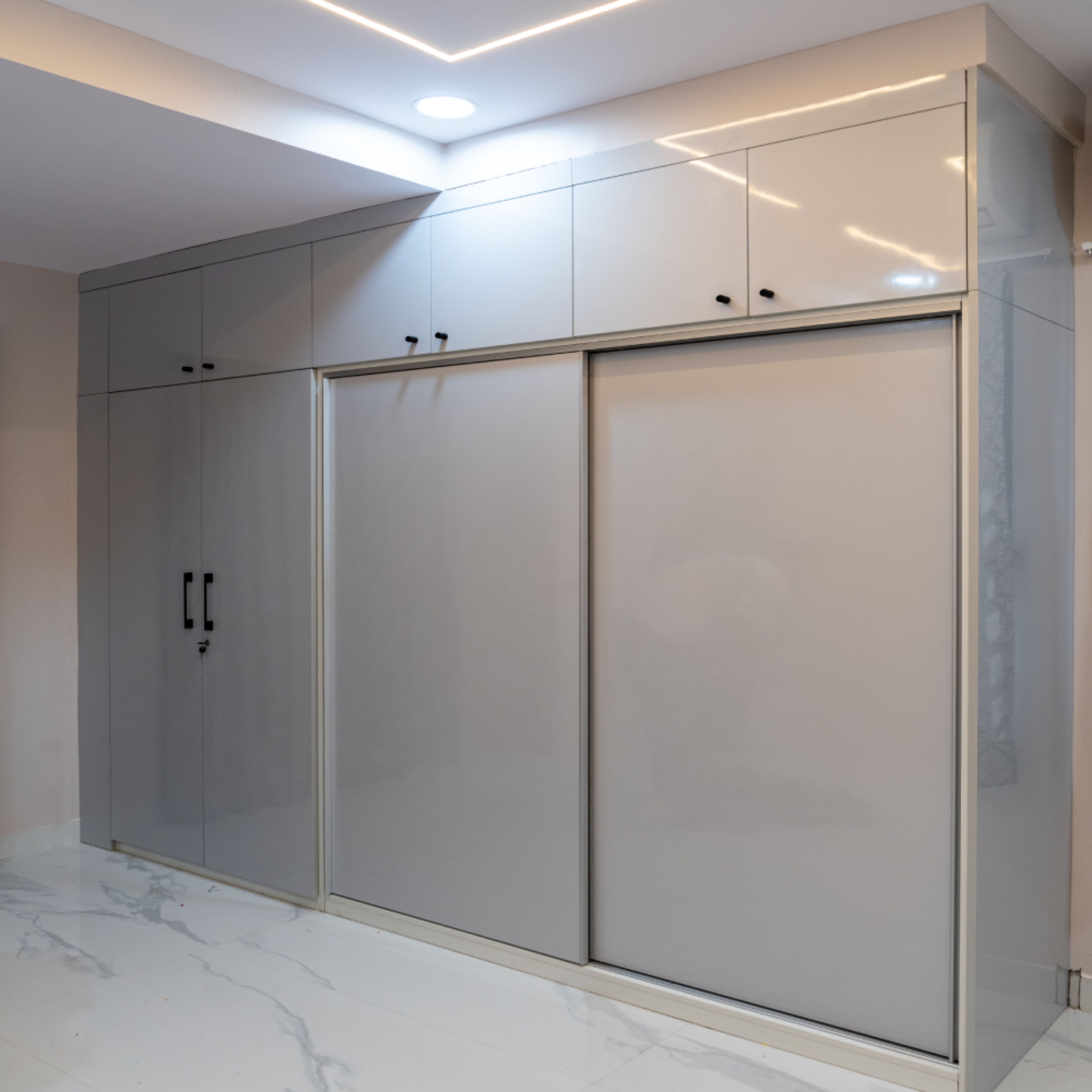 2-Door Grey Sliding Wardrobe Design with 2-Door Swing Wardrobe with Loft Unit