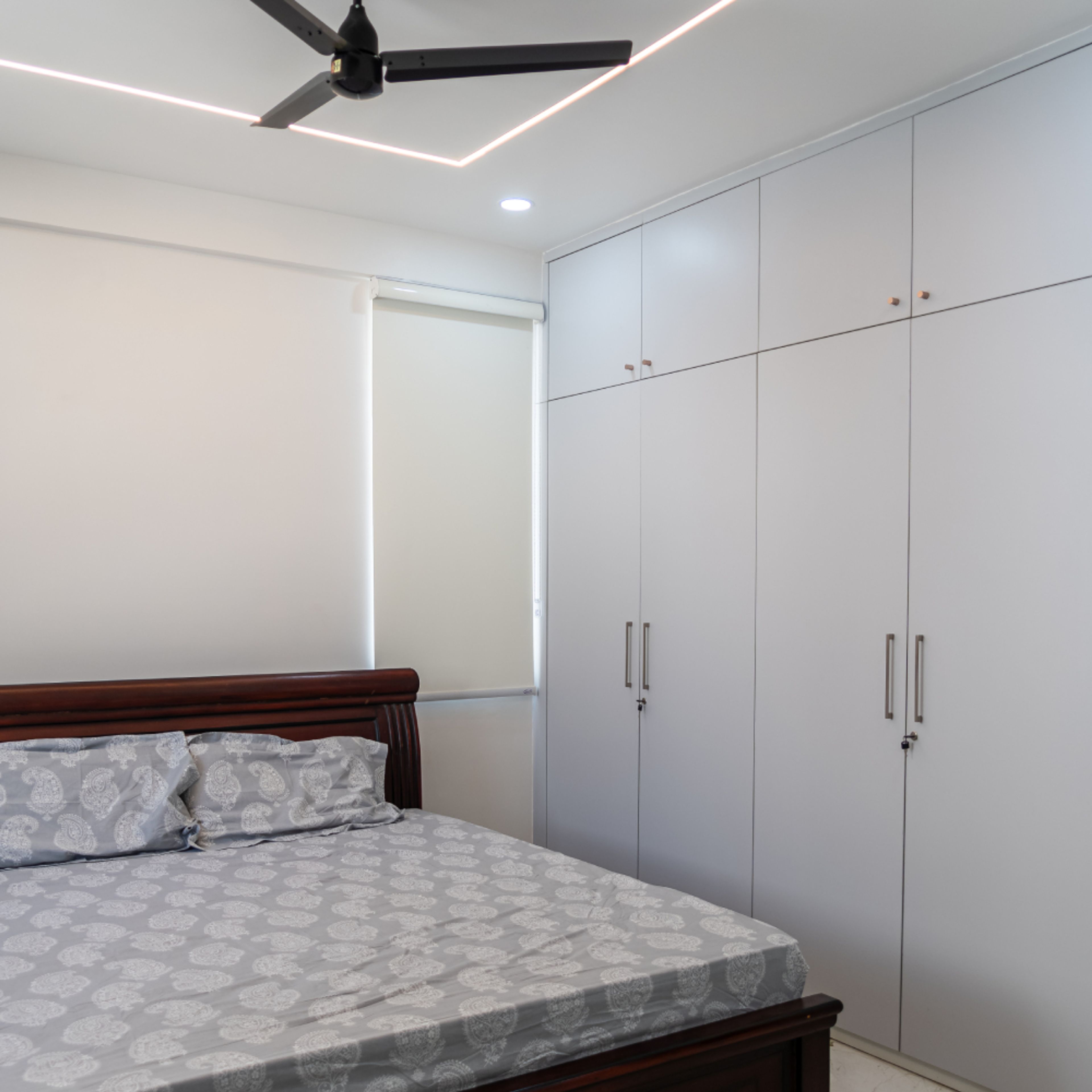 Guest Bedroom Design with 4-Door Light Grey Swing Wardrobe with Loft Unit