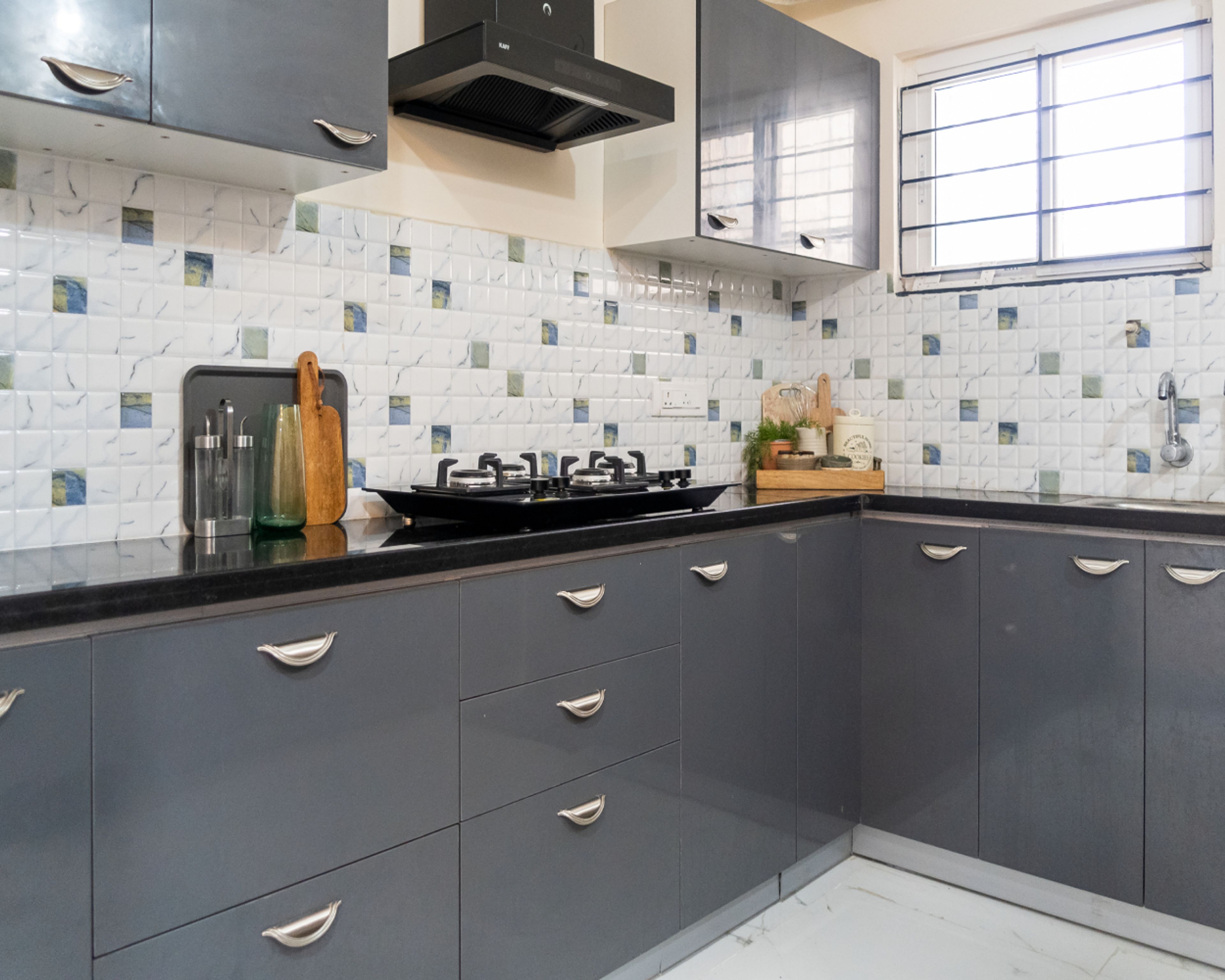 L-Shaped Kitchen Design with Grey Base and Wall Units and Granite Countertop