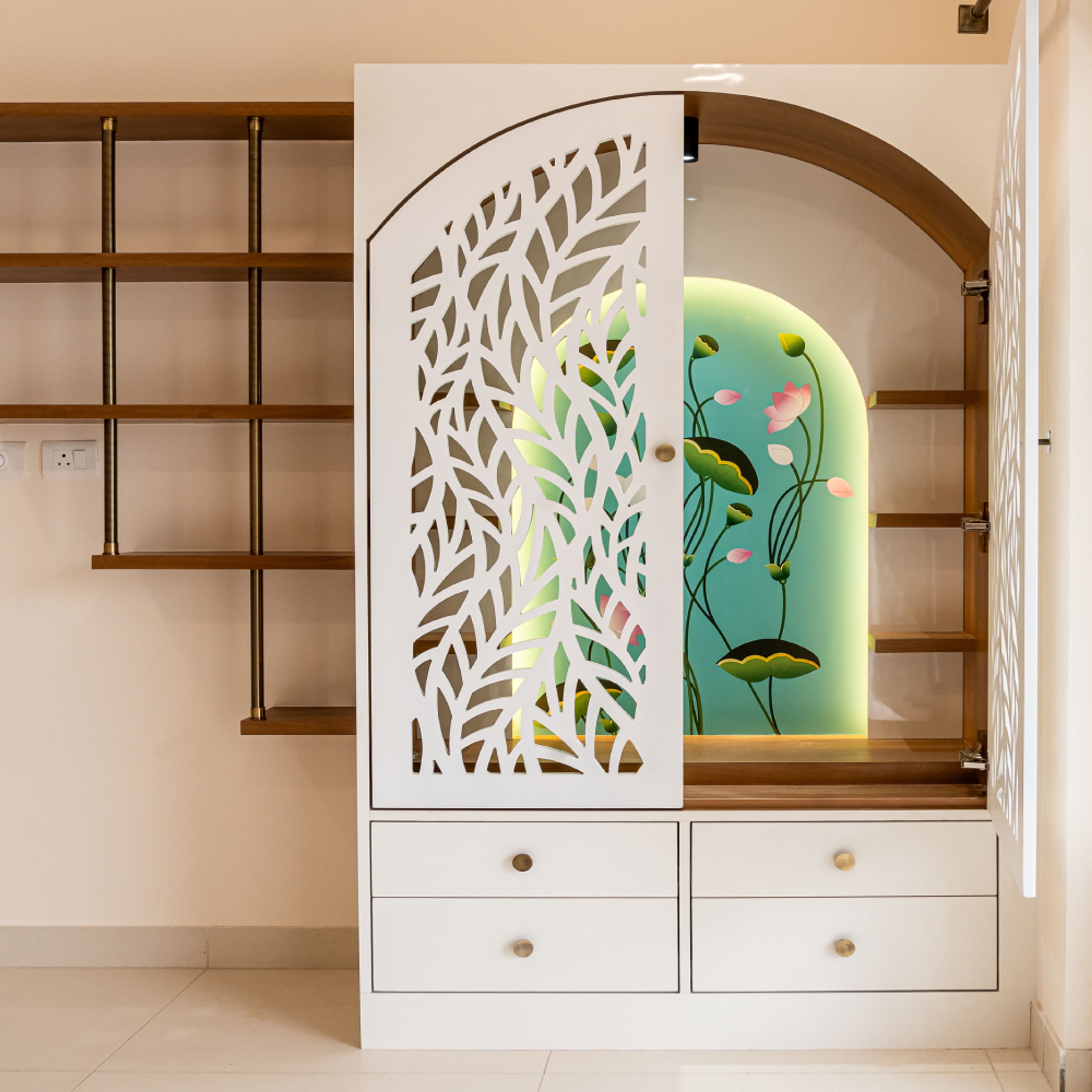Foyer Design with White Lattice-Patterned Cabinet with Arched Alcove and Floral Backlit Panel