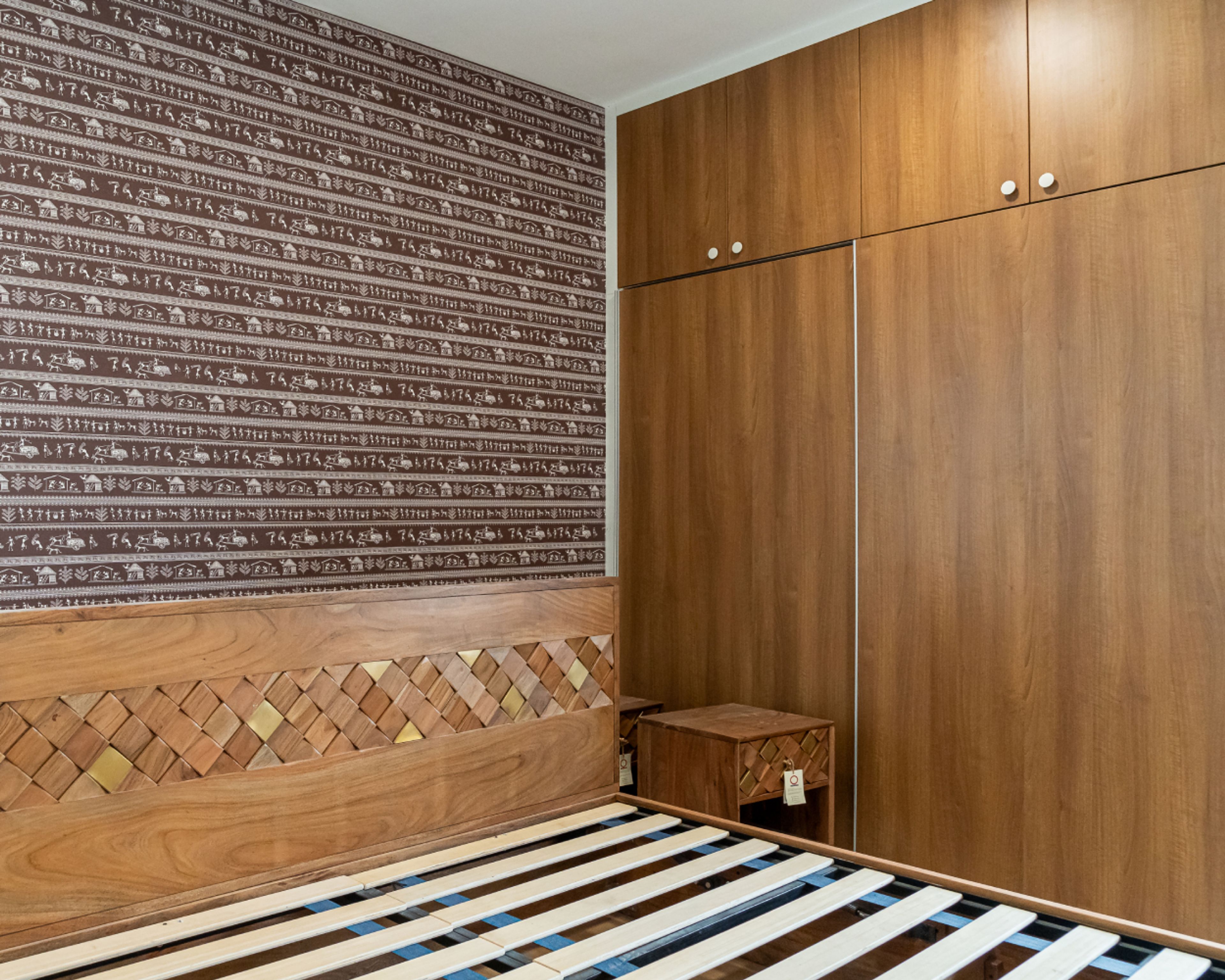 Master Bedroom Design with Tribal-Patterned Wallpaper and Wooden Built-In Sliding Wardrobe