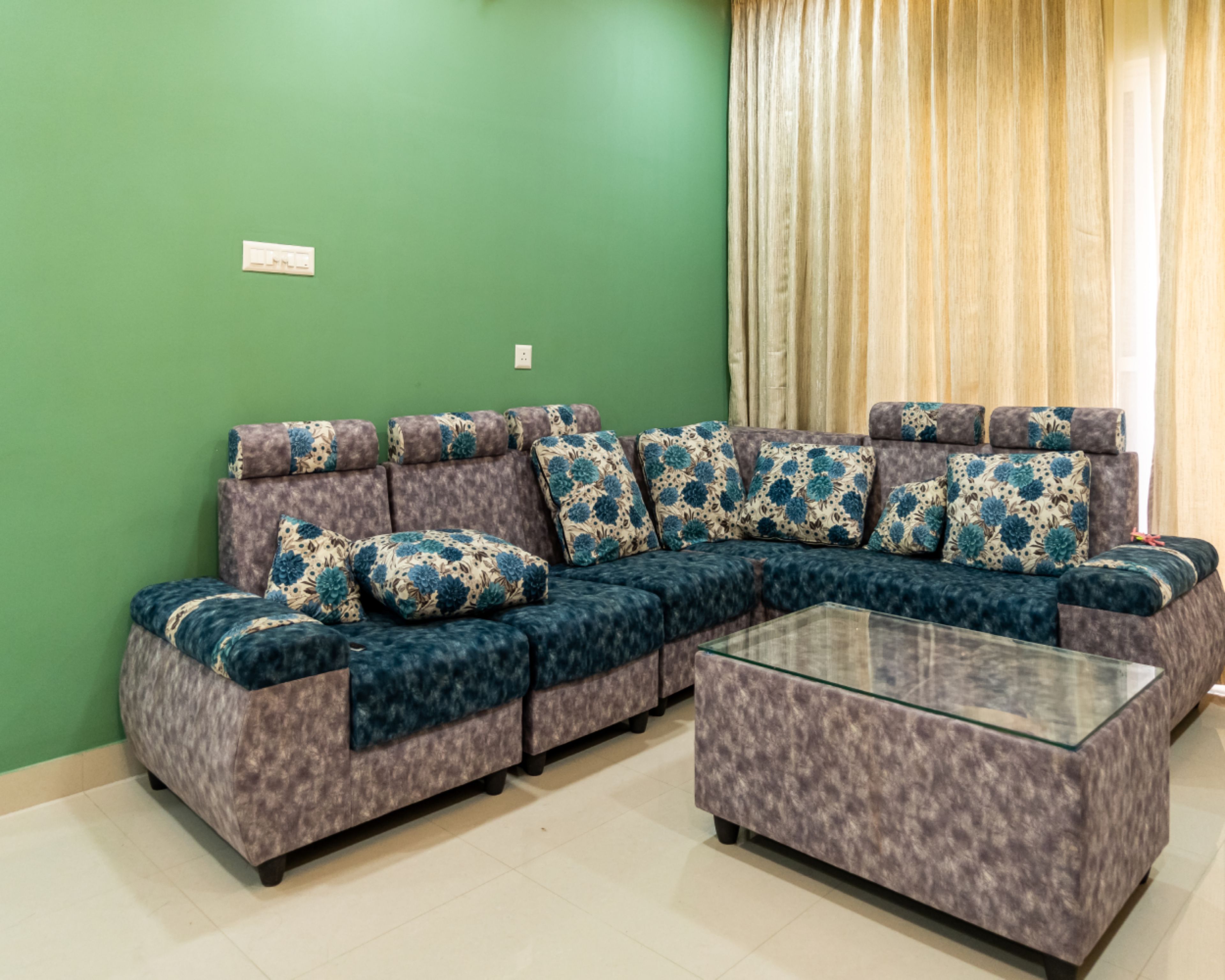 Living Room Design with Floral Pattern L-Shaped Sofa