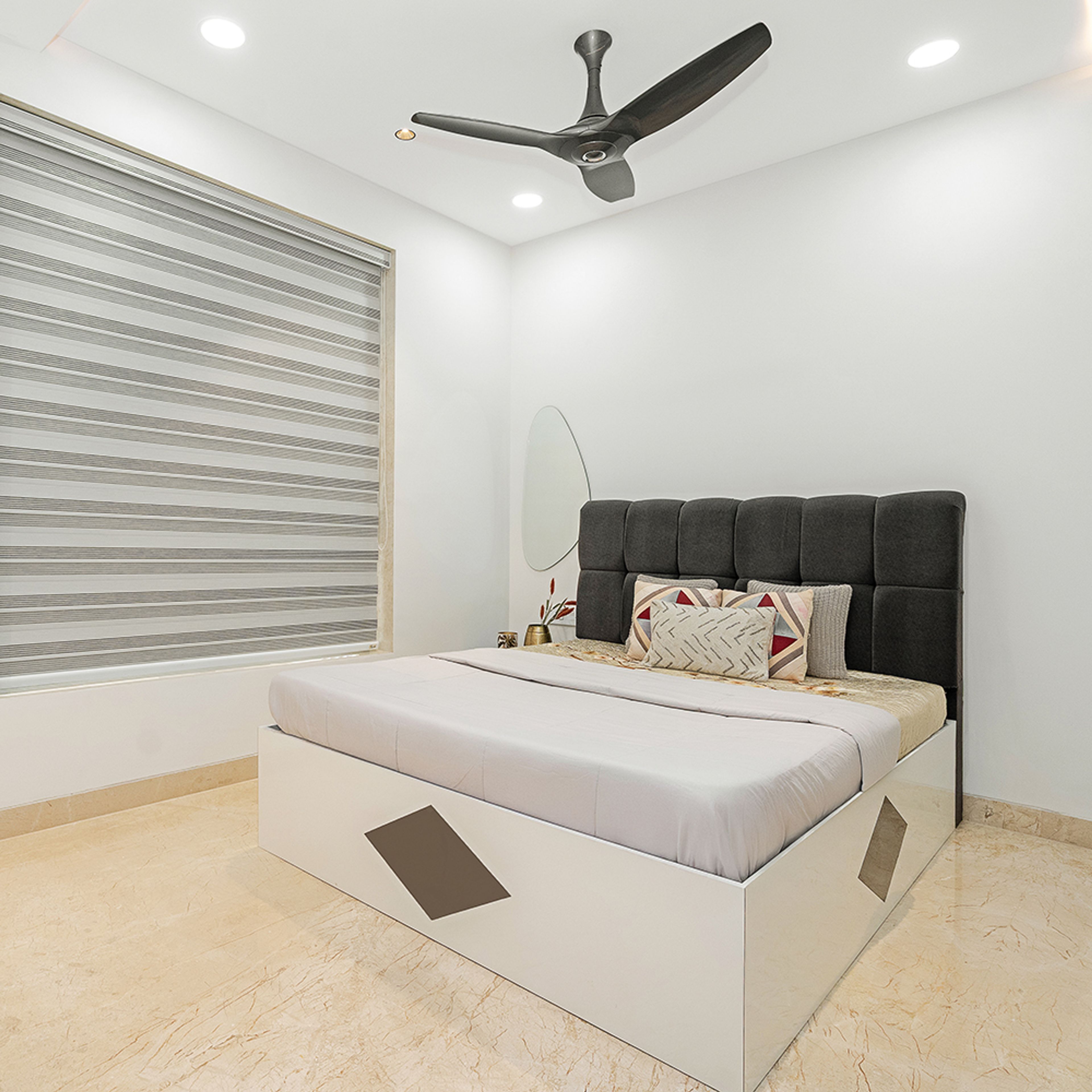 Bedroom Design with Black Tufted Headboard Bed and White Wall