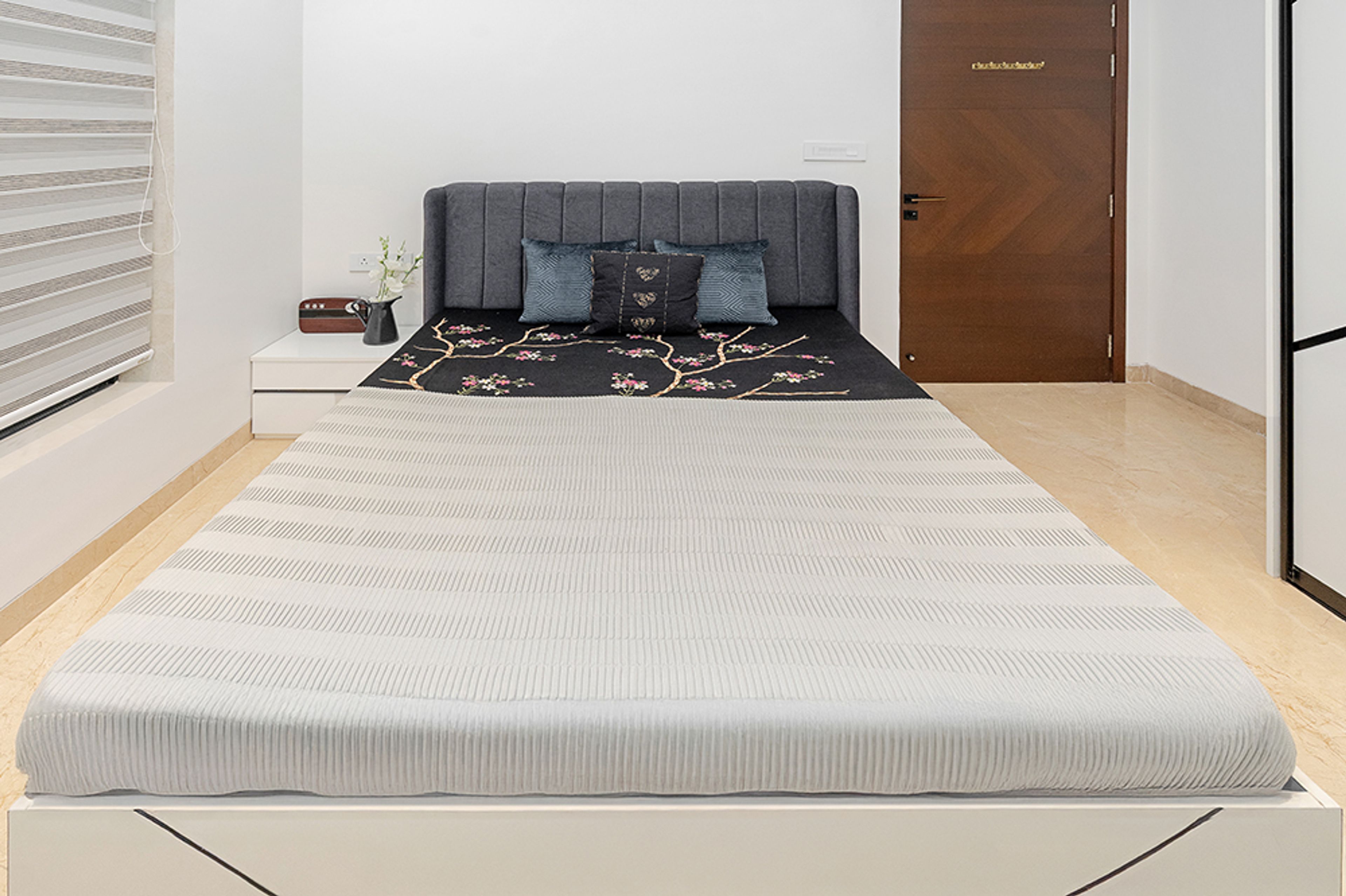 Bedroom Design with Grey Tufted Headboard Bed