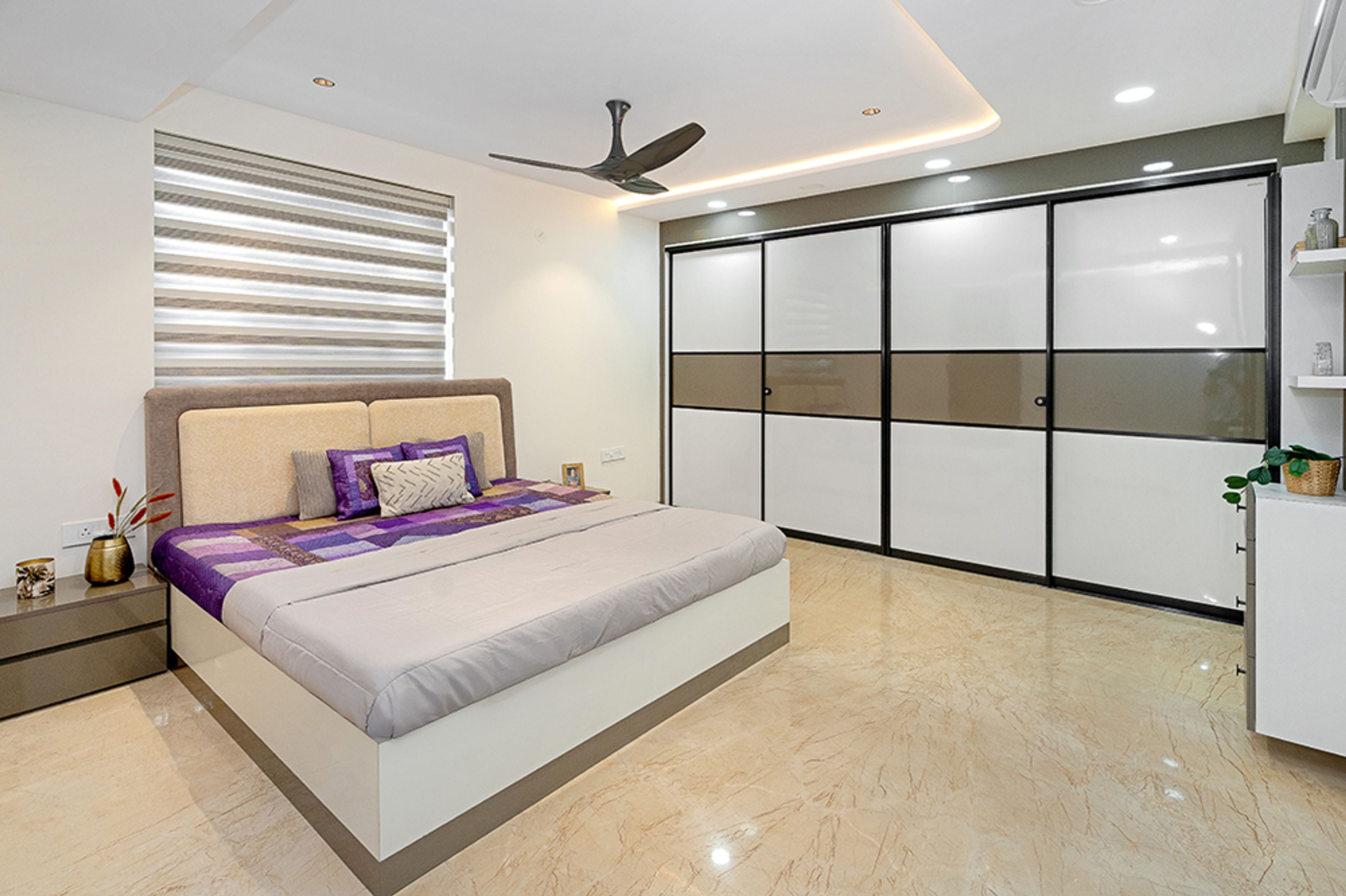 Bedroom Design with White and Brown 4-Door Sliding Wardrobe